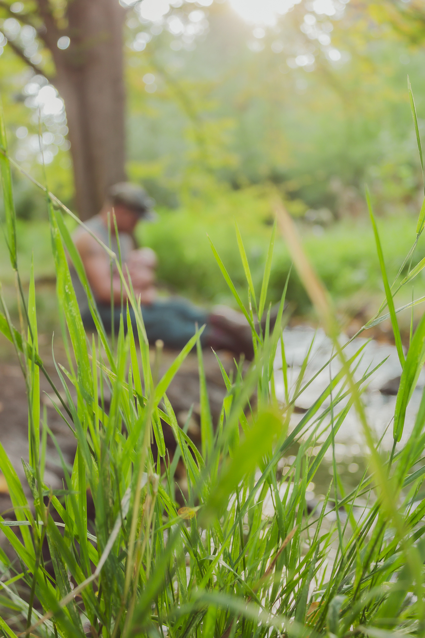 Grass look at Cody and his son by the creek, Father and Son Session, Finch Arboretum, Spokane Washington, 2020, Victoria EB Photography