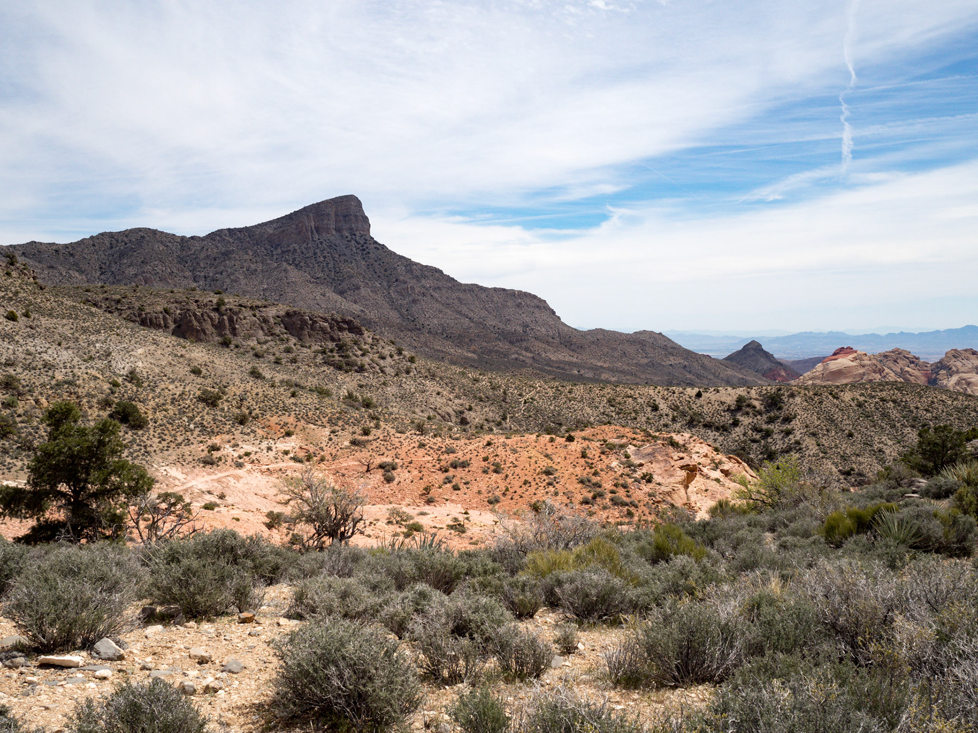 In October, 2015 I was in Las Vegas for AWS reInvent conference. One of the things I wish I had time for was visit the natural areas around Las Vegas. This time (March, 2016), however, we rented a car at Harrah’s and went hiking in the Red Rock Canyon National Conservation Area (https://en.wikipedia.org/wiki/Red_Rock_Canyon_National_Conservation_Area). There is no way to properly capture the beauty of the Red Rock, no way to pick a perfect lens or a perfect camera. You need to be there to fully appreciate it.

Note on the workflow: I am glad I took these photos using RAW+JPEG format. Normally I only shoot JPEG, but since I only recently got the Olympus PEN-F I wanted to be on the safe side and have RAW available to me. Somehow in the JPEGs the camera subdued the colors and blew out the highlights. Reds weren’t as red as I remember them, for instance, and the sky had more texture to it. Luckily, RAW had all that information and so I was able to easily post process the files in Lightroom.
