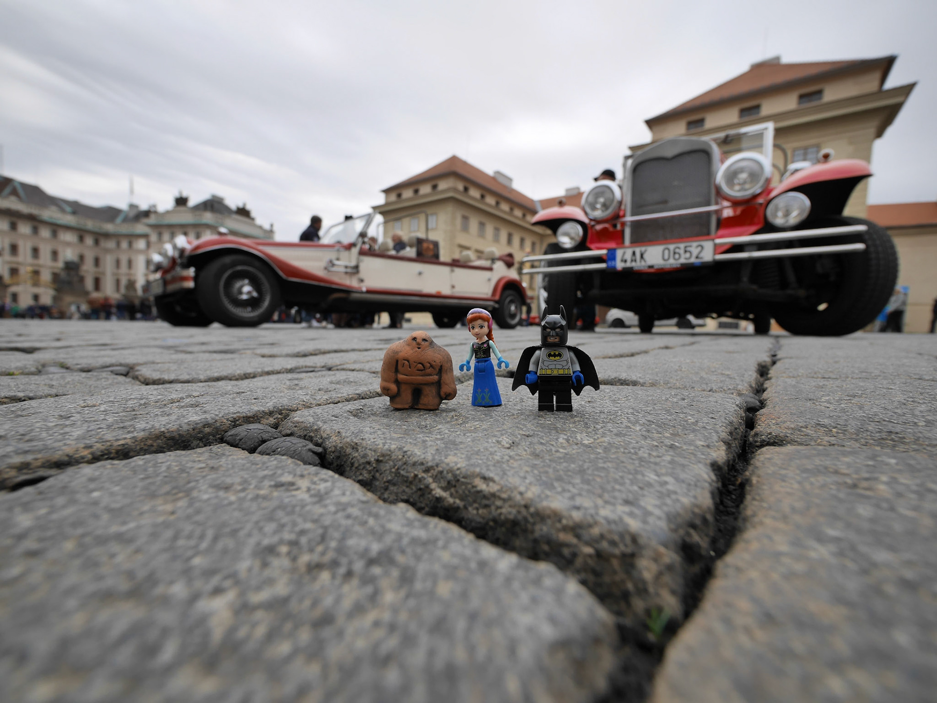 Lego Batman, Anna and their new friend Golem are touring Prague's Old City