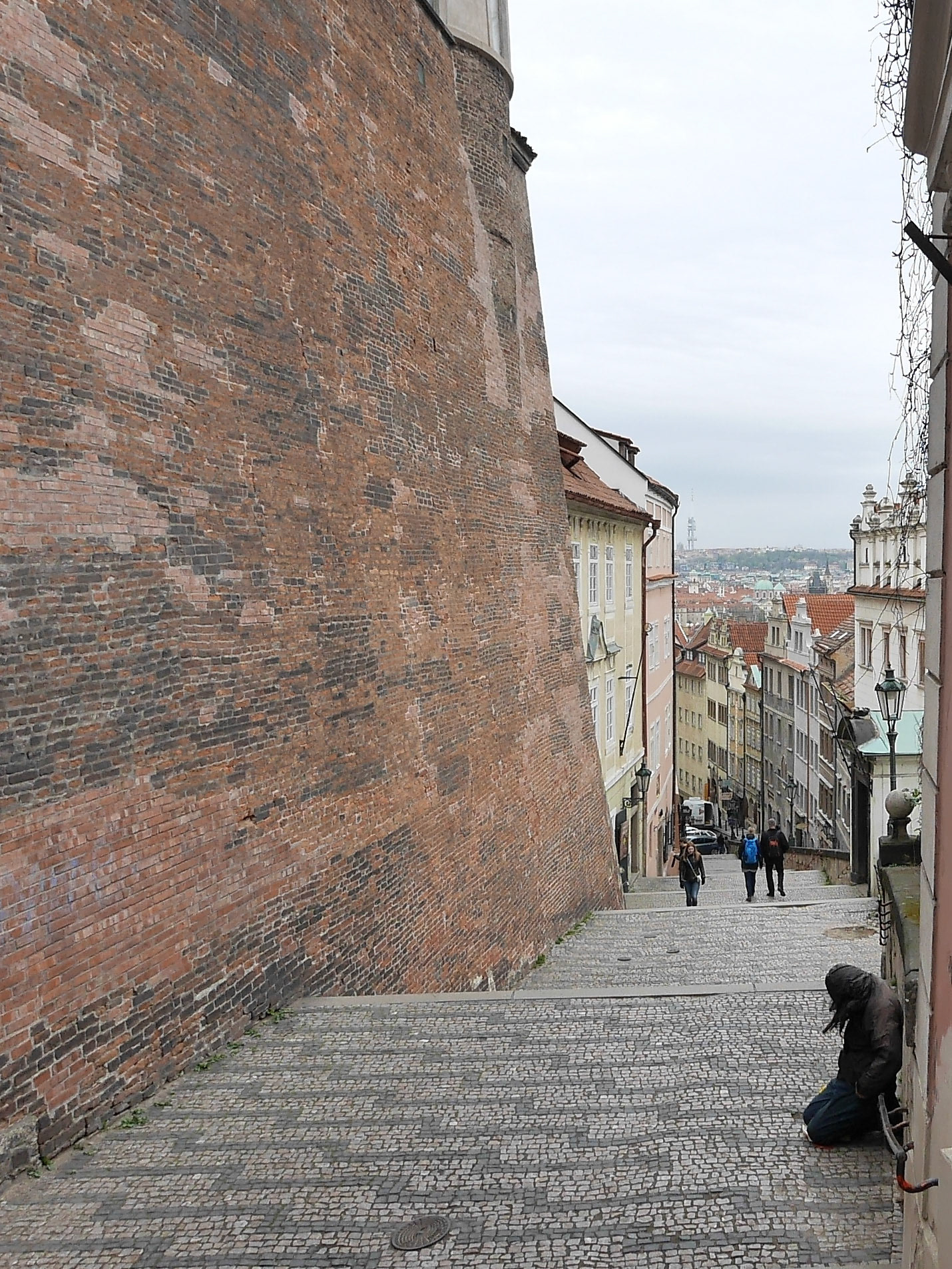 Beggar on the steps