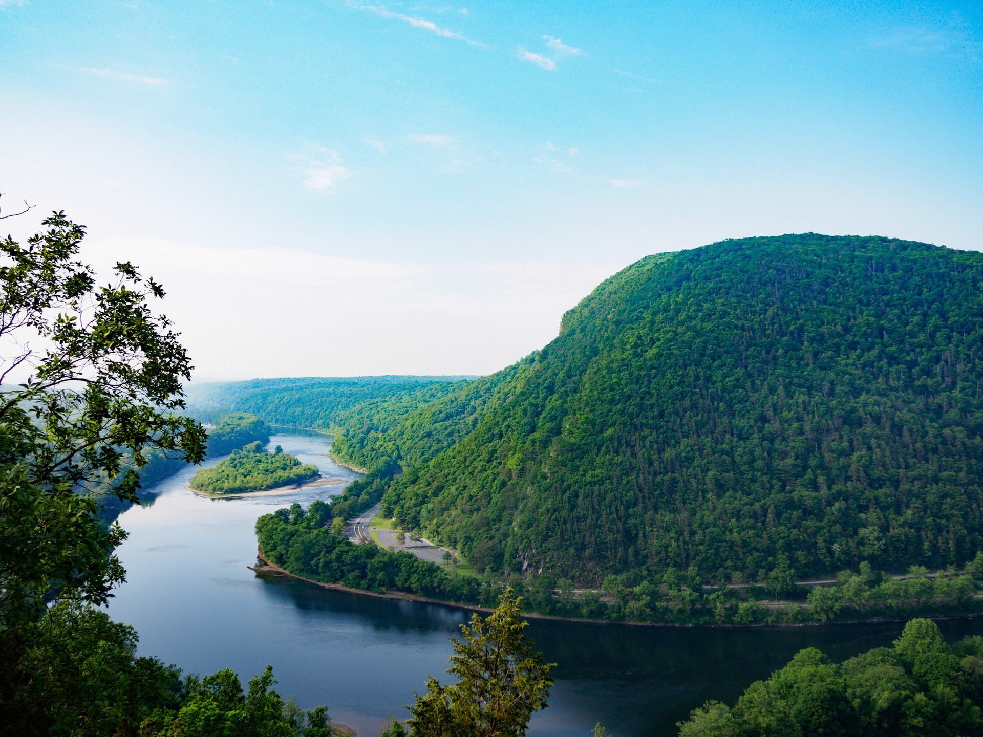Mt. Tammany is a popular hiking destination in New Jersey. About an hour from the New York City, it gets crowded on the weekends. You need to come early, around 8am, to get a parking spot. Regardless of when you come, you won't have the trail all to yourself. But the trail is family friendly and there are multiple ways to get to the summit depending on the skill level. The trail offers spectacular views from the summit. Enjoy a swim in the natural ponds and waterfalls on a hot day.

Learn more at http://www.njhiking.com/mt-tammany/