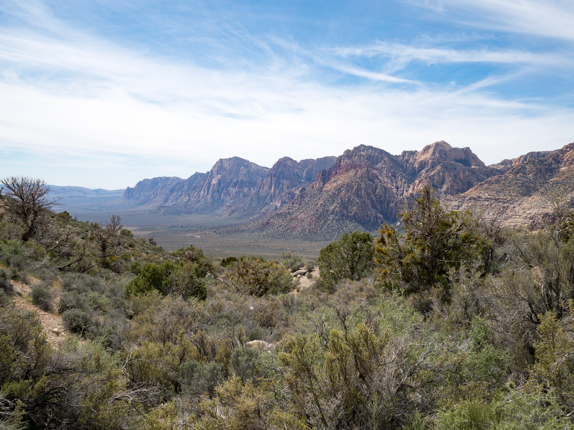 In October, 2015 I was in Las Vegas for AWS reInvent conference. One of the things I wish I had time for was visit the natural areas around Las Vegas. This time (March, 2016), however, we rented a car at Harrah’s and went hiking in the Red Rock Canyon National Conservation Area (https://en.wikipedia.org/wiki/Red_Rock_Canyon_National_Conservation_Area). There is no way to properly capture the beauty of the Red Rock, no way to pick a perfect lens or a perfect camera. You need to be there to fully appreciate it.

Note on the workflow: I am glad I took these photos using RAW+JPEG format. Normally I only shoot JPEG, but since I only recently got the Olympus PEN-F I wanted to be on the safe side and have RAW available to me. Somehow in the JPEGs the camera subdued the colors and blew out the highlights. Reds weren’t as red as I remember them, for instance, and the sky had more texture to it. Luckily, RAW had all that information and so I was able to easily post process the files in Lightroom.