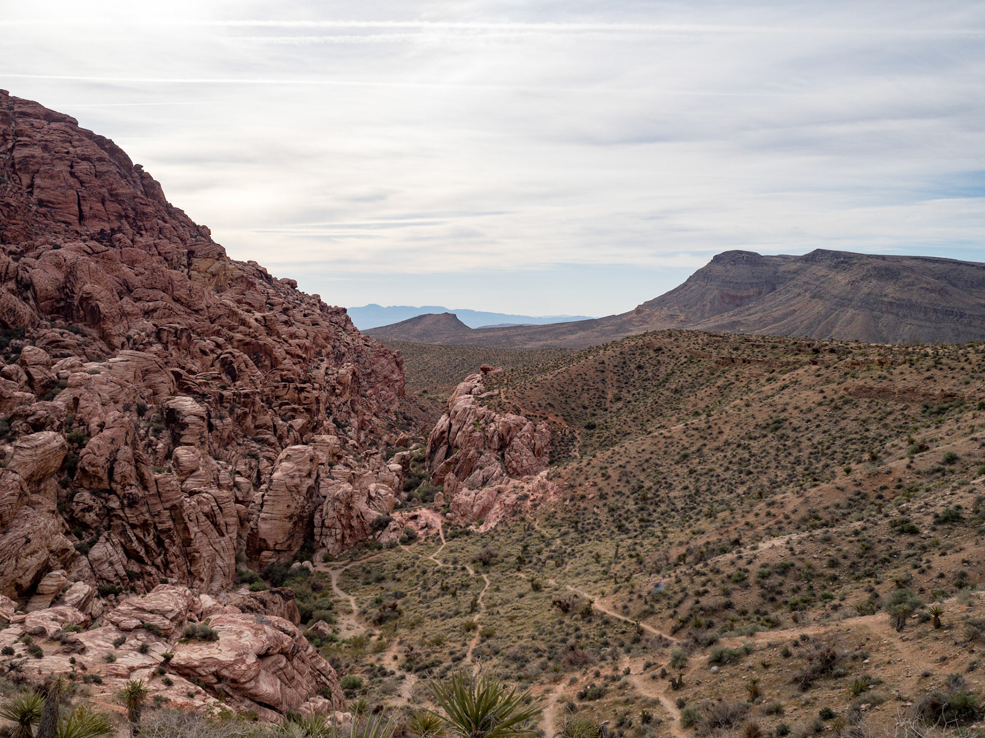 In October, 2015 I was in Las Vegas for AWS reInvent conference. One of the things I wish I had time for was visit the natural areas around Las Vegas. This time (March, 2016), however, we rented a car at Harrah’s and went hiking in the Red Rock Canyon National Conservation Area (https://en.wikipedia.org/wiki/Red_Rock_Canyon_National_Conservation_Area). There is no way to properly capture the beauty of the Red Rock, no way to pick a perfect lens or a perfect camera. You need to be there to fully appreciate it.

Note on the workflow: I am glad I took these photos using RAW+JPEG format. Normally I only shoot JPEG, but since I only recently got the Olympus PEN-F I wanted to be on the safe side and have RAW available to me. Somehow in the JPEGs the camera subdued the colors and blew out the highlights. Reds weren’t as red as I remember them, for instance, and the sky had more texture to it. Luckily, RAW had all that information and so I was able to easily post process the files in Lightroom.
