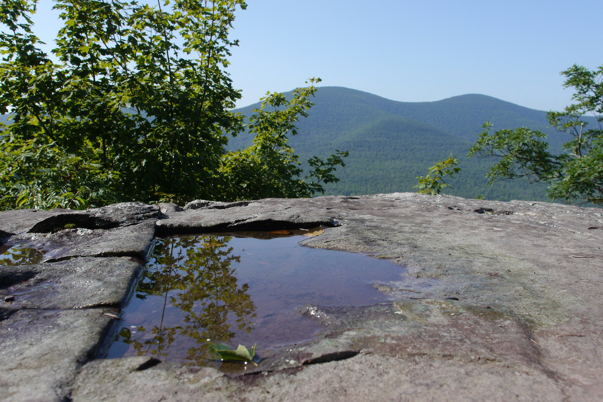 Having spent several years of my youth attending college in the Adirondacks, I became well familiar with the mountains of upstate New York -- both Catskills and Adirondacks. I love coming back to this area, every now and then, to retrace the hiking trails, and enjoy the views that I enjoyed when I was younger. It is nice to come back to same place and take photographs and see how it changed -- or didn't.