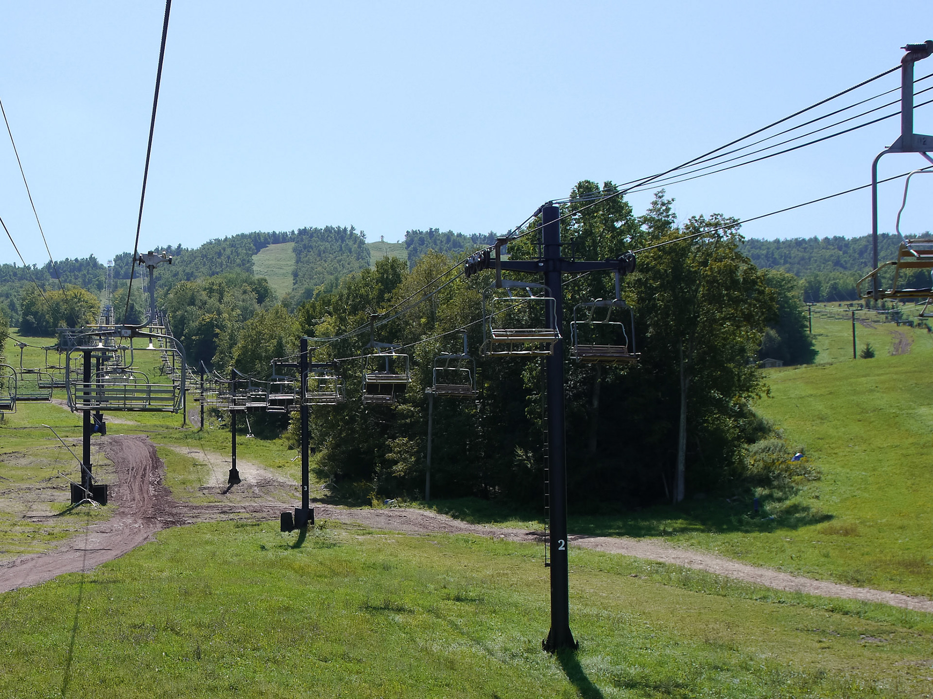 Having spent several years of my youth attending college in the Adirondacks, I became well familiar with the mountains of upstate New York -- both Catskills and Adirondacks. I love coming back to this area, every now and then, to retrace the hiking trails, and enjoy the views that I enjoyed when I was younger. It is nice to come back to same place and take photographs and see how it changed -- or didn't.