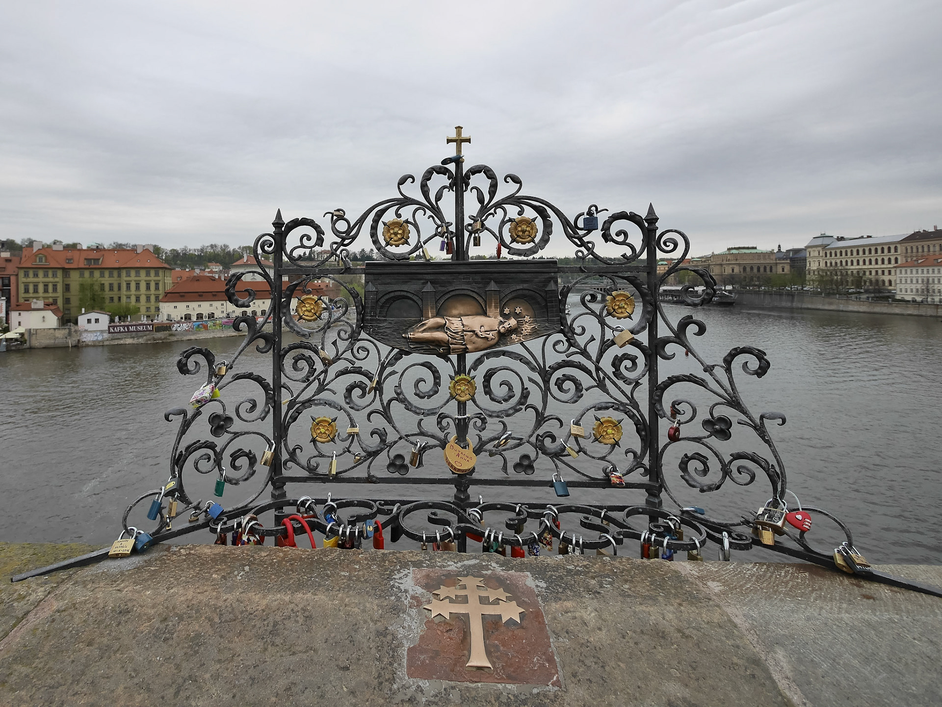 Couples sign or engrave their locks and attach them to this metalworks on the Charles Bridge in Prague