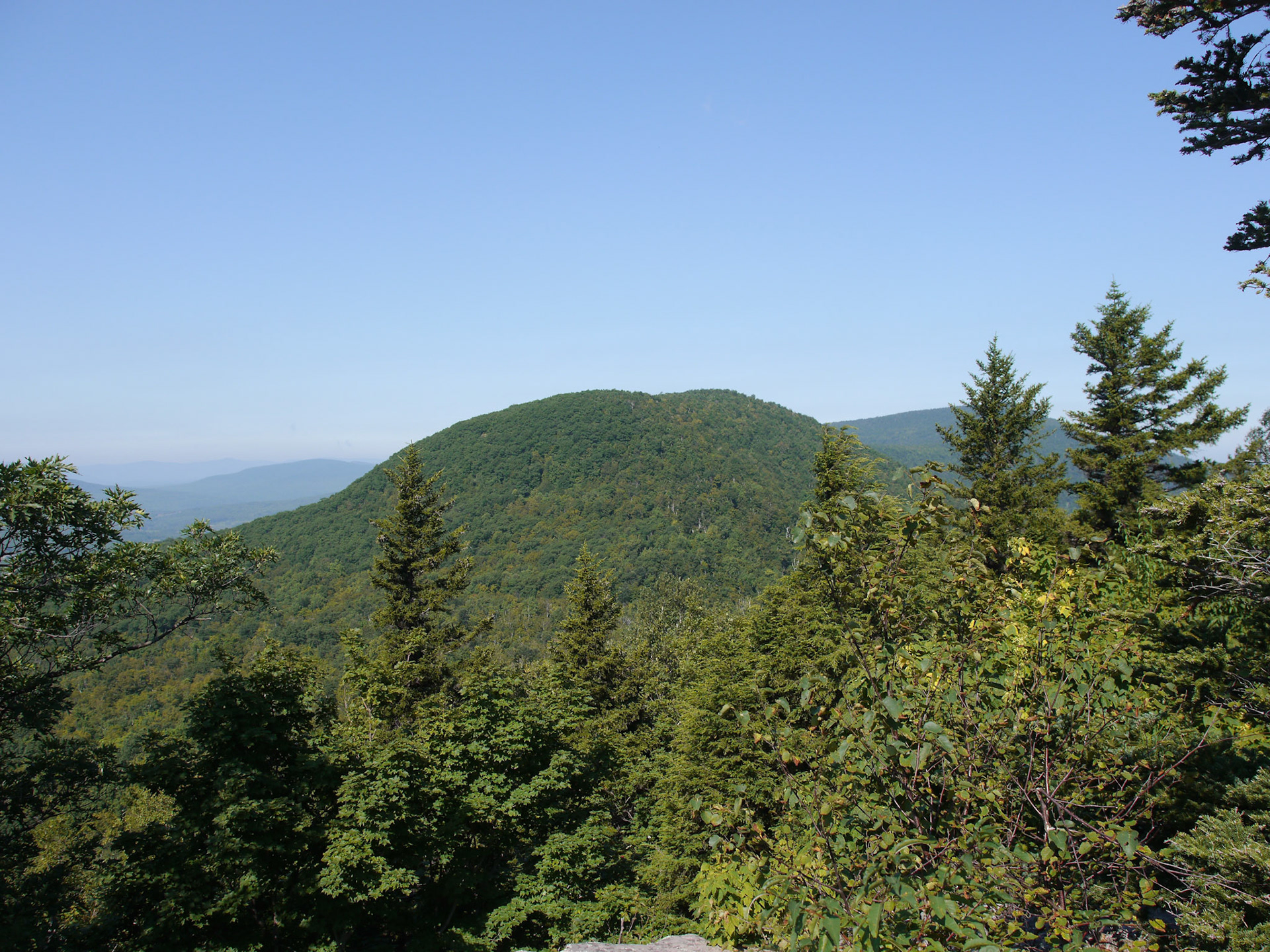 Having spent several years of my youth attending college in the Adirondacks, I became well familiar with the mountains of upstate New York -- both Catskills and Adirondacks. I love coming back to this area, every now and then, to retrace the hiking trails, and enjoy the views that I enjoyed when I was younger. It is nice to come back to same place and take photographs and see how it changed -- or didn't.