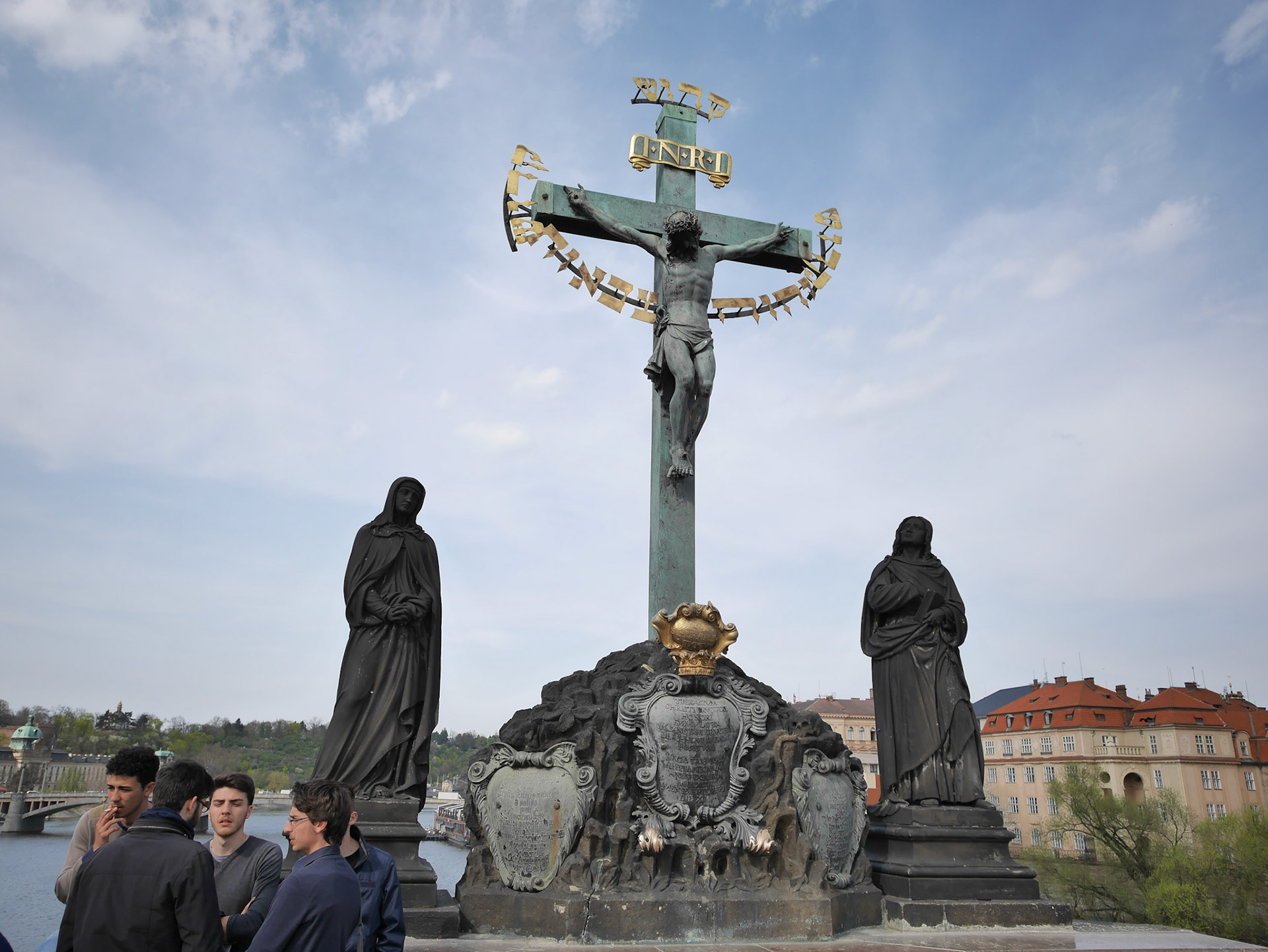 This statue is one of the signs of historical European anti-semitism. Read about it here: http://strangeside.com/prague-statue-of-jesus-with-hebrew-letters/