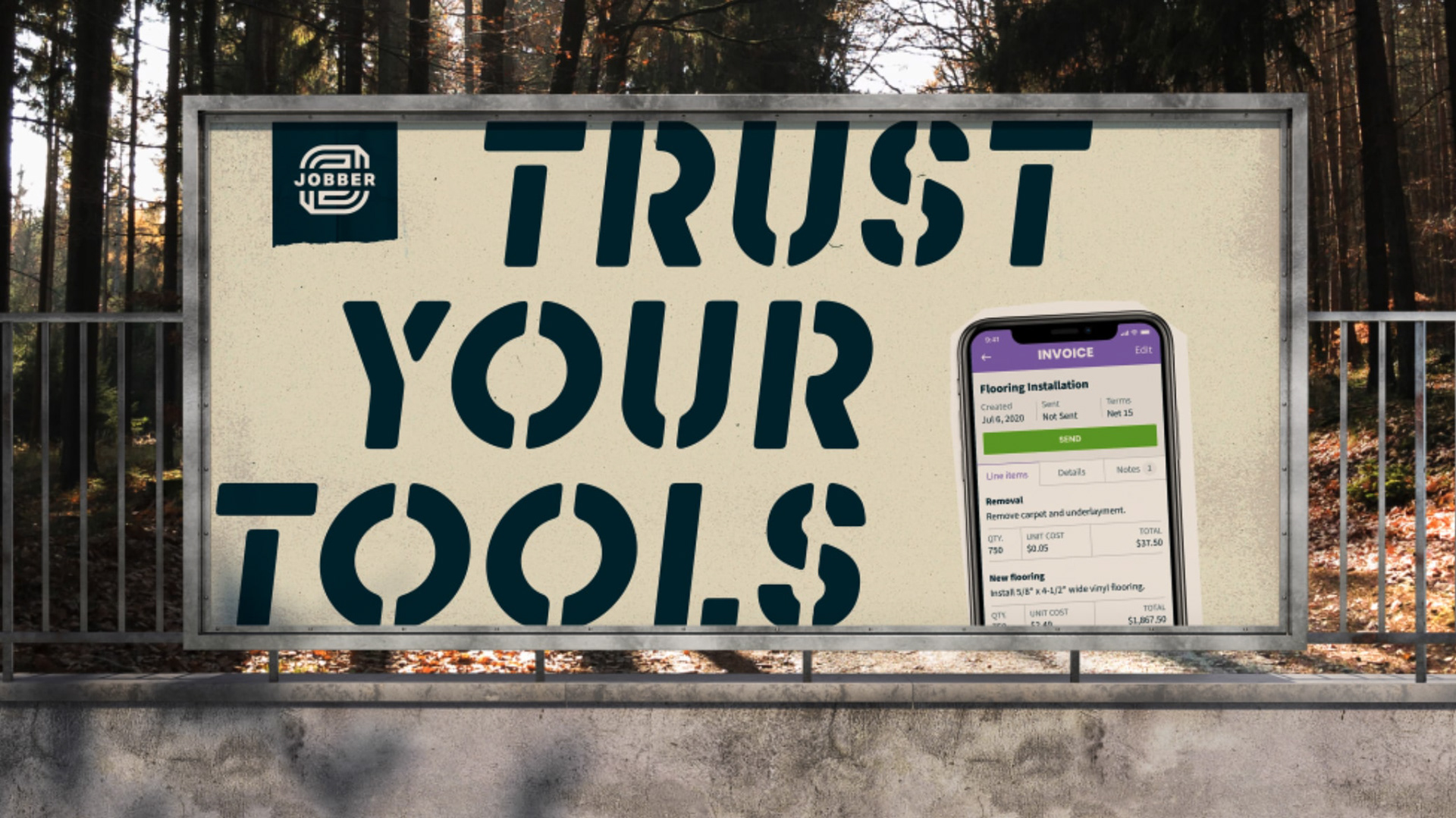 A billboard that says "Trust Your Tools" in large text alongside the Jobber logo and a smartphone showing the Jobber app.