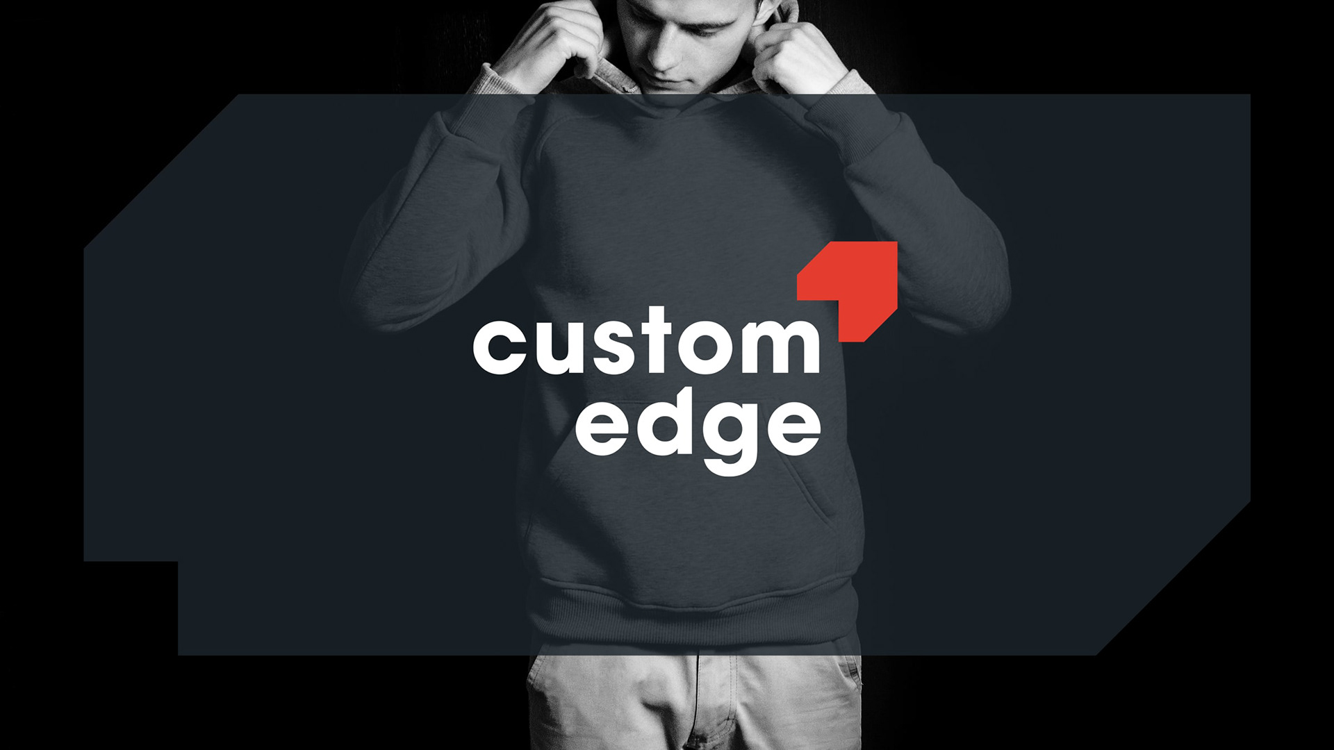Custom Edge logo overlaid on a photo of a man wearing a plain hoodie.