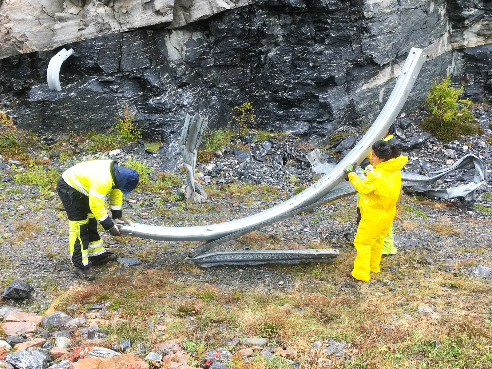 Testing different configurations with the crash barrier fragments we salvaged from the landslide / Copyright © Christopher Pearson 2019