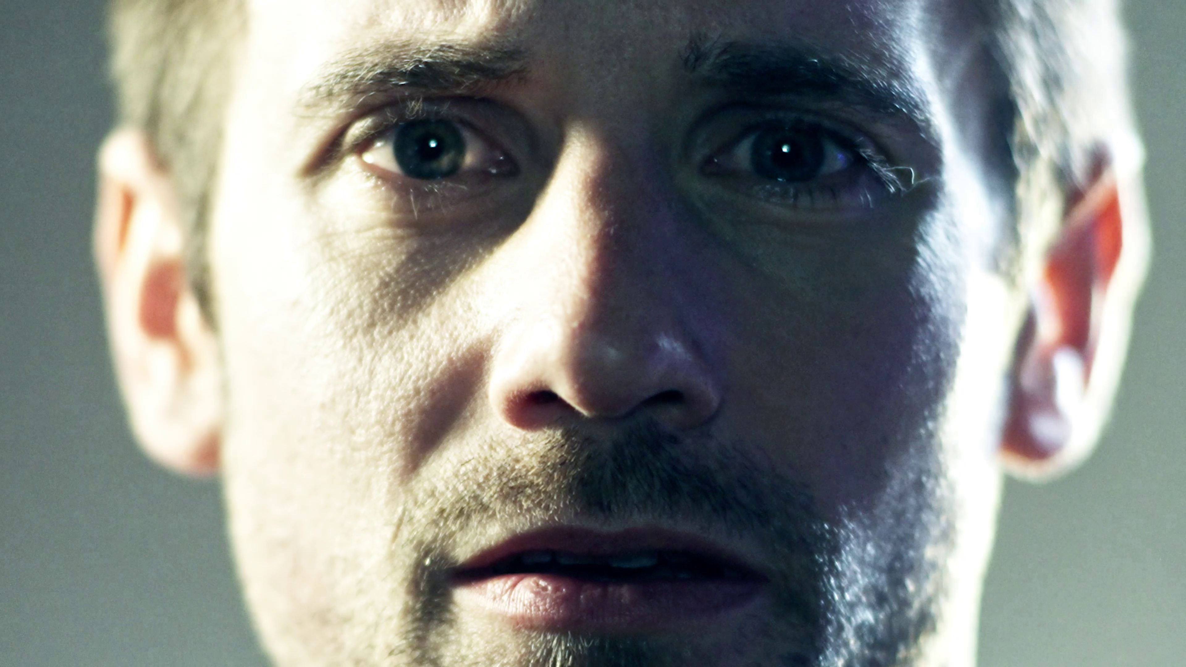 close up of male soldier face distressed from PTSD