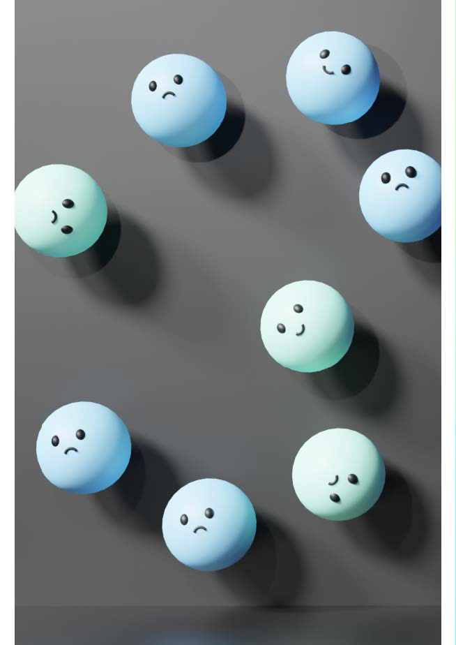 A page of scattered green and blue spheres with smiling or sad faces..