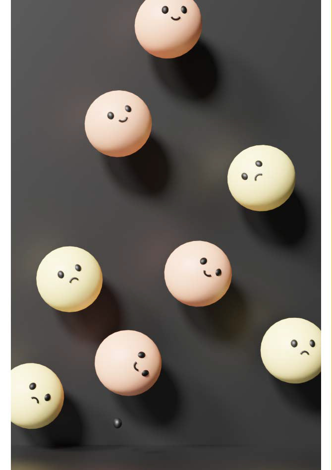A page of scattered orange and yellow spheres with smiling or sad faces..