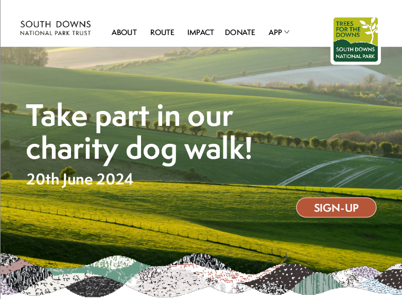 Screenshot of a website design that uses a photo of rolling green hills, an orange sign-up button and title text.