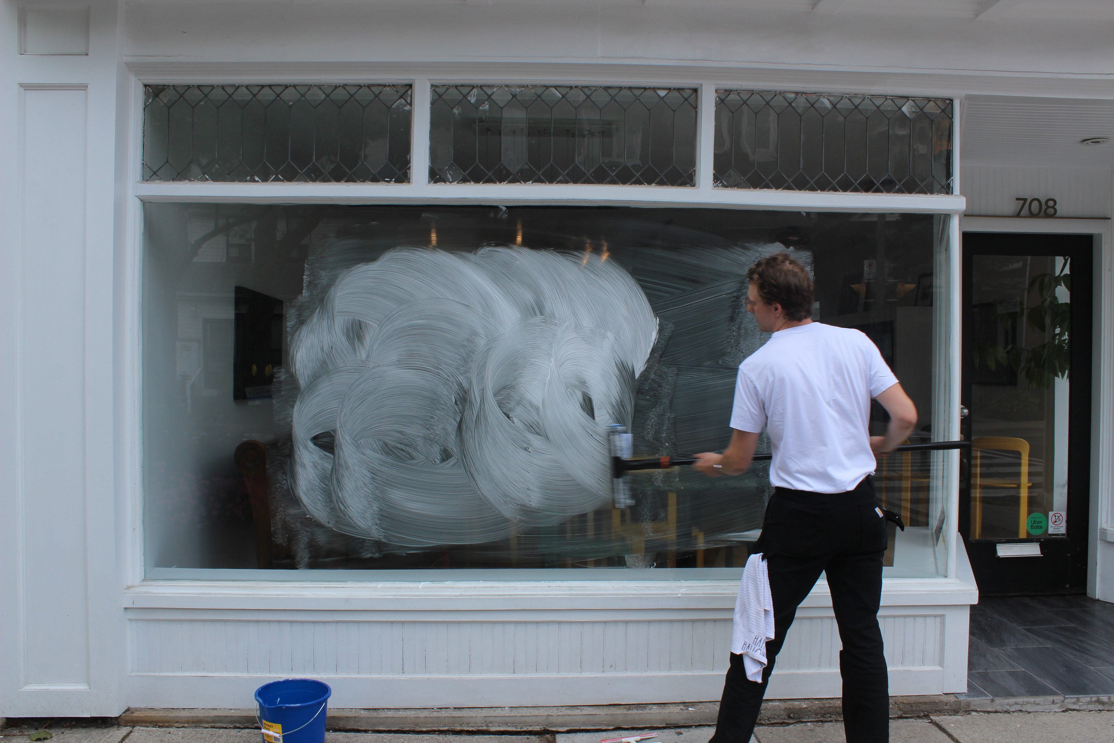 Spreading soap suds.