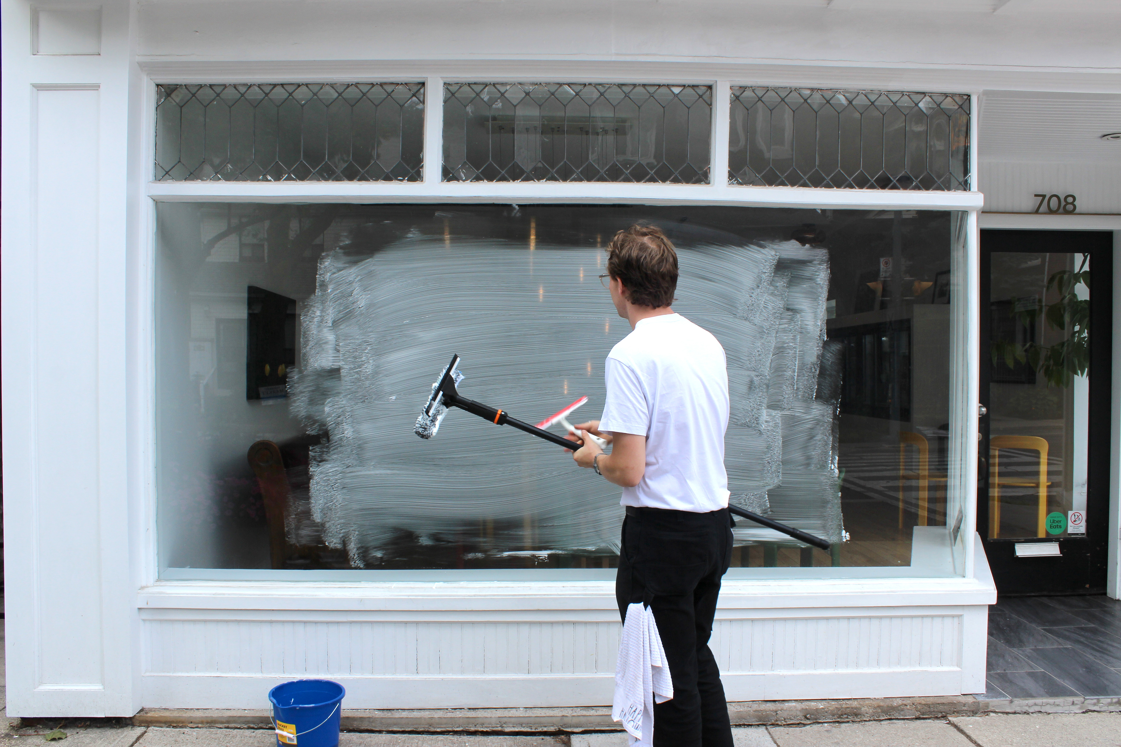Preparing to squeegee letters.