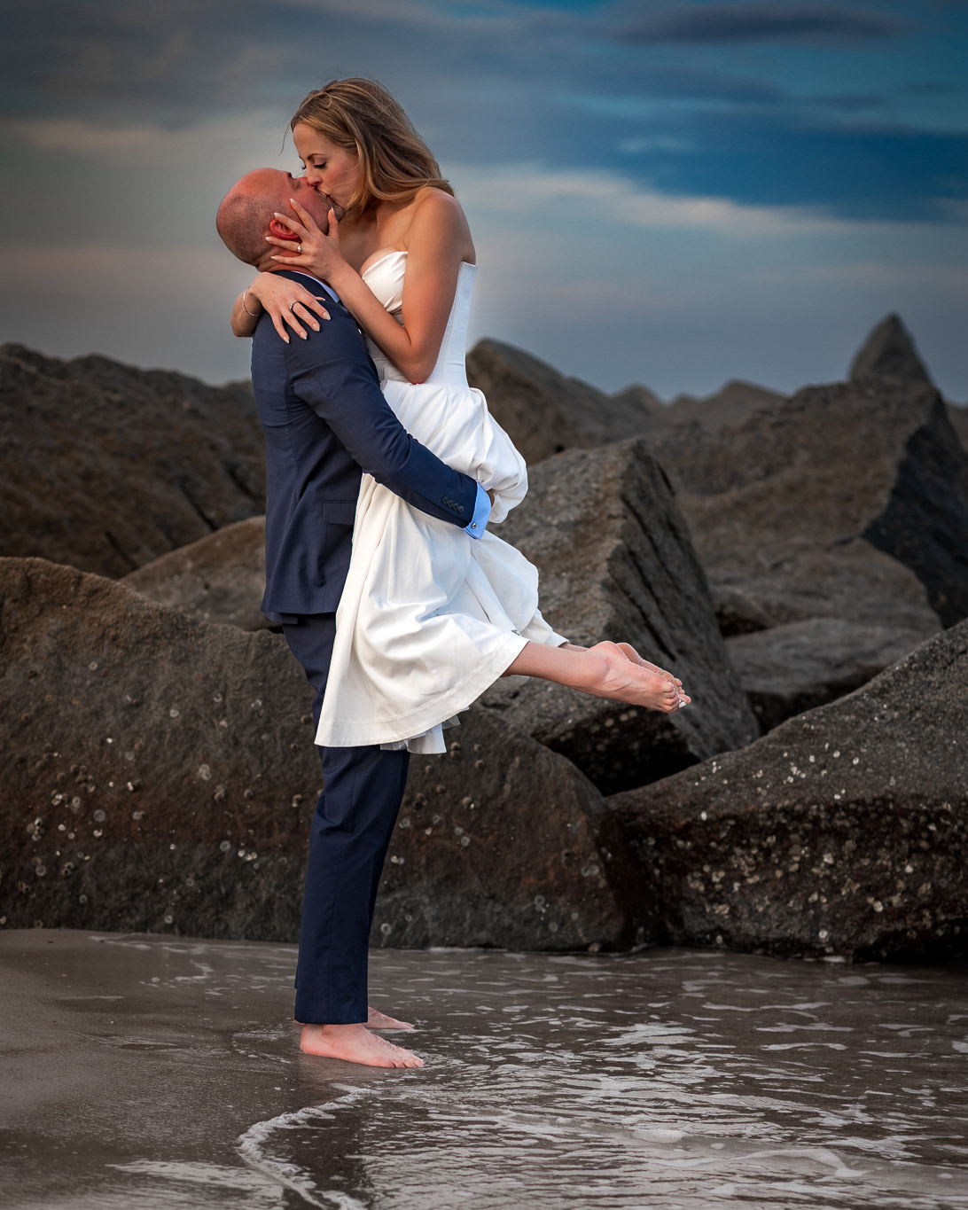 Intimate elopements and wedding portraits near the coquina rocks at Vilano Beach, St. Augustine
