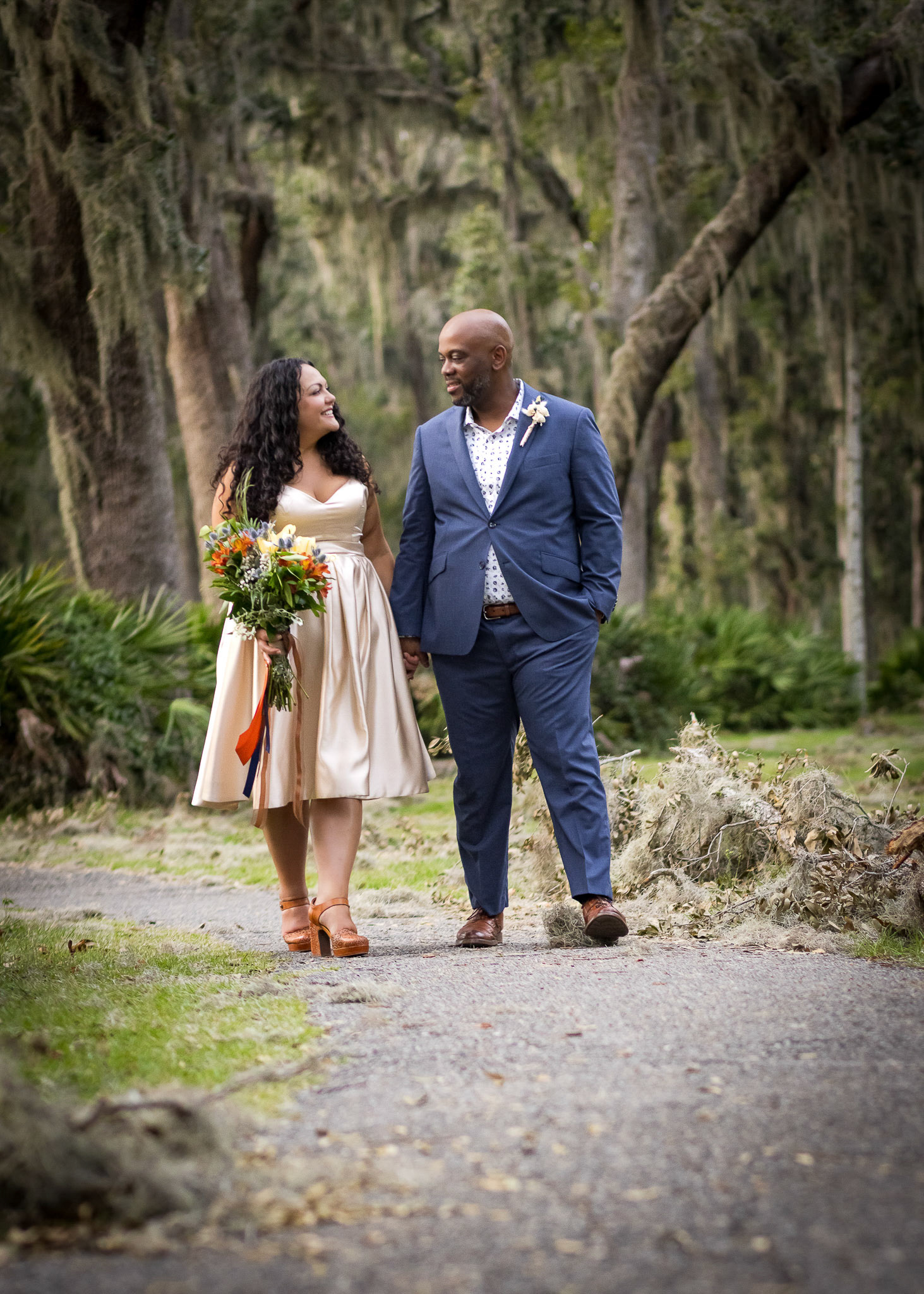 Newlyweds walking at Riverwalk in Jacksonville Wedding