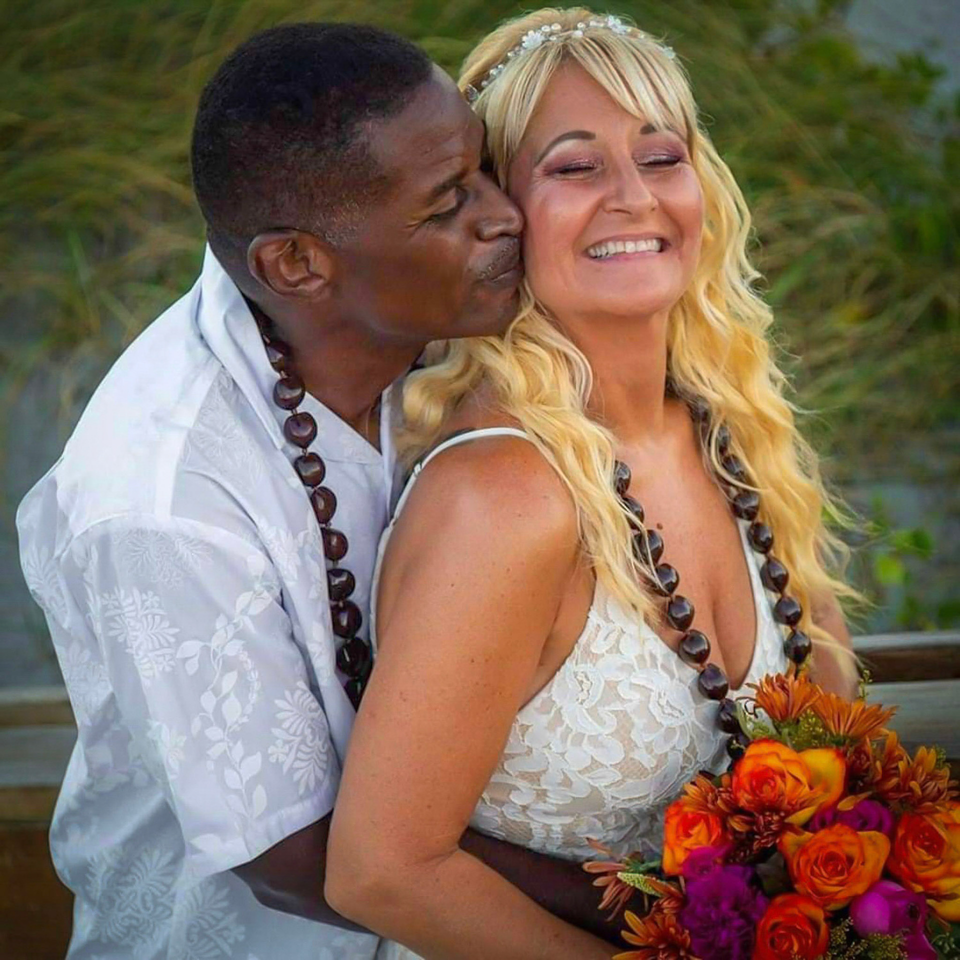 Candid Destination Wedding Portrait in Jacksonville Beach with tropical floral details