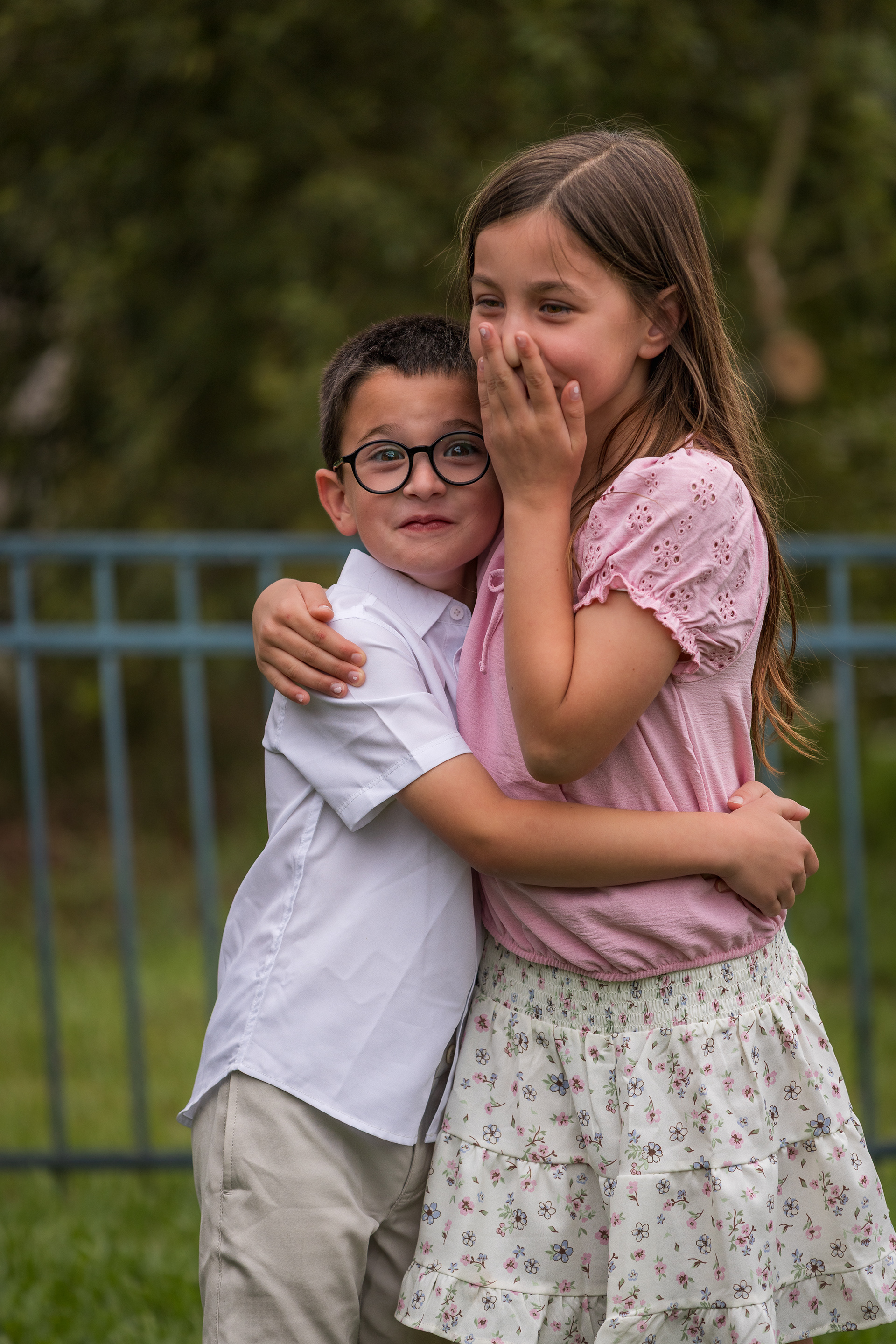 Siblings laughing during Family Photo Session at Ponte Vedra Beach