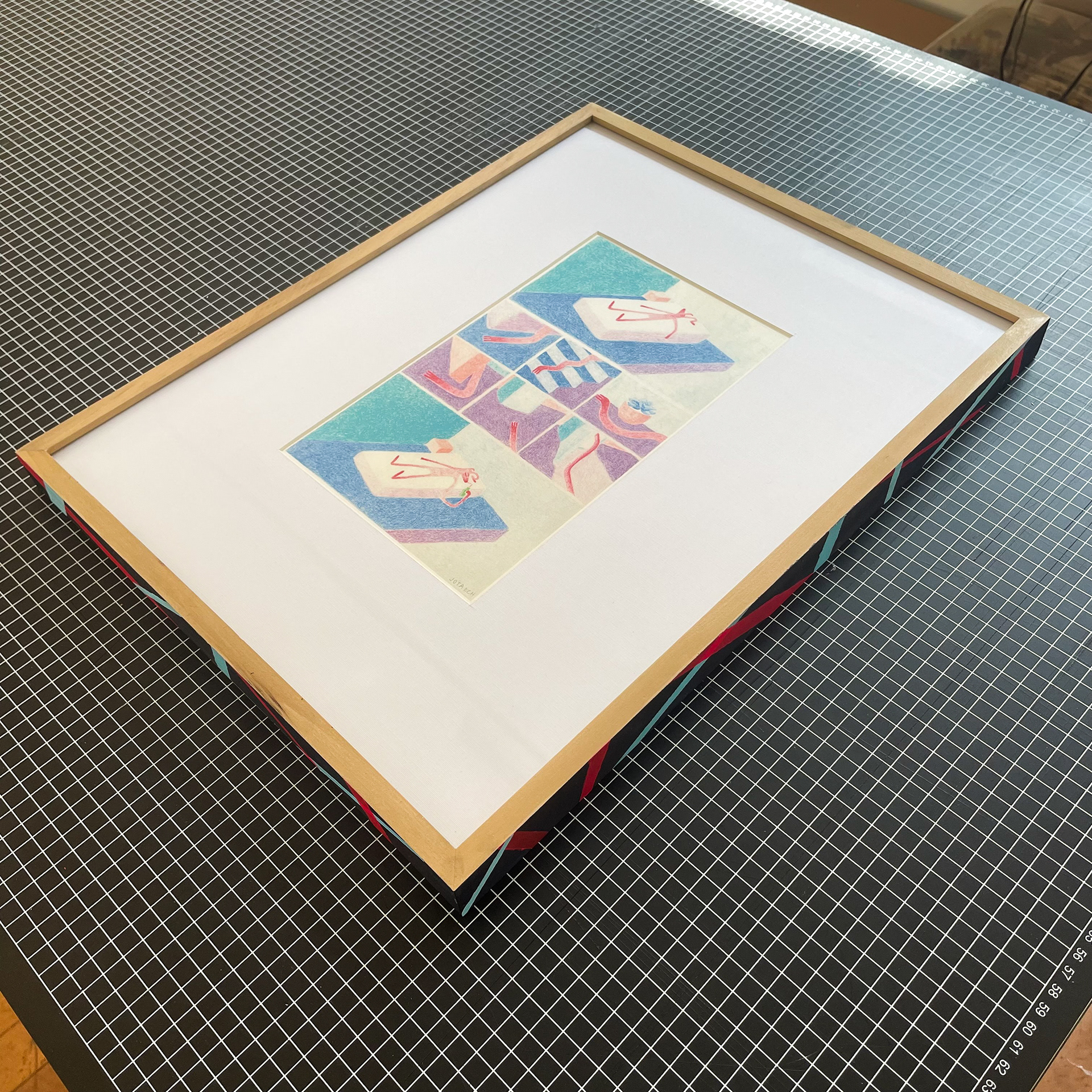 Obra: Jotaech. Enmarcación con paspartú. Moldura 13x30mm, madera tepa con borde pintado.