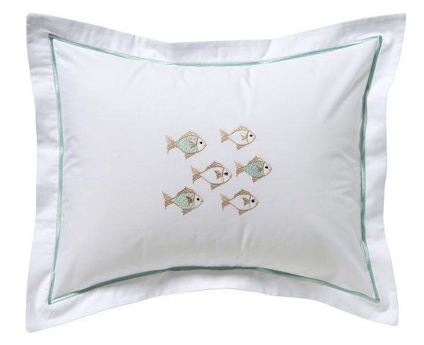 school of fish in beige and aqua embroidery design transposed on top of a white cotton pillow with aqua piping
