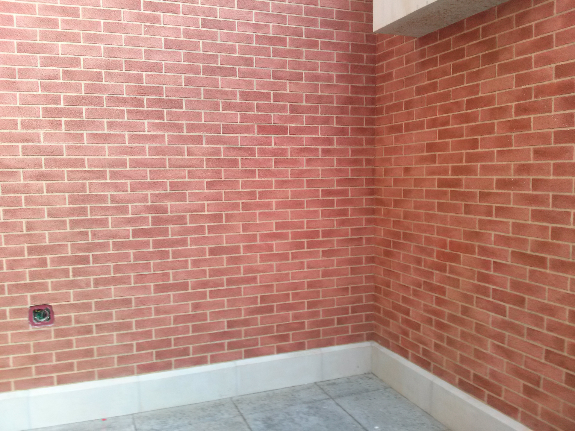 3 stories of hand-painting fake bricks and grout