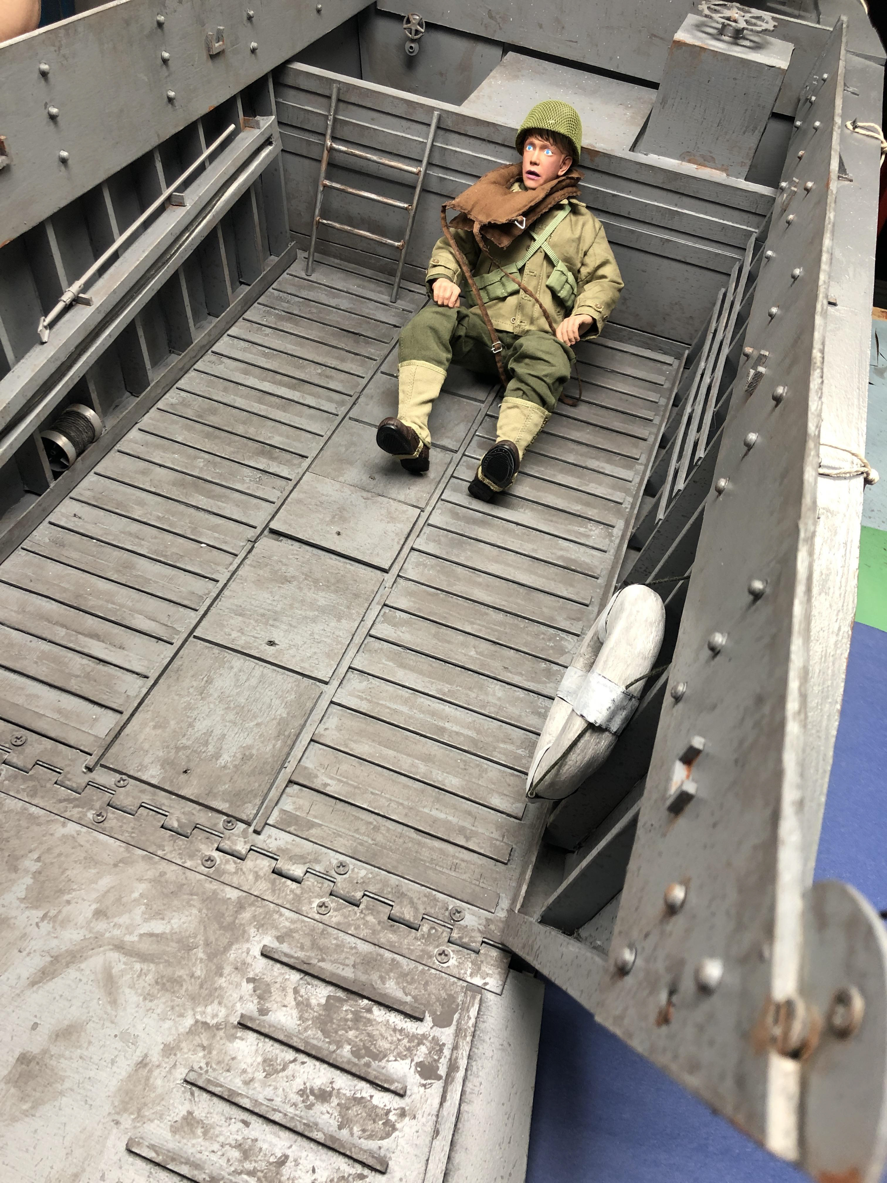 Soldier Puppet for photo. Wooden floor for stop-motion tie downs with replacement slats.