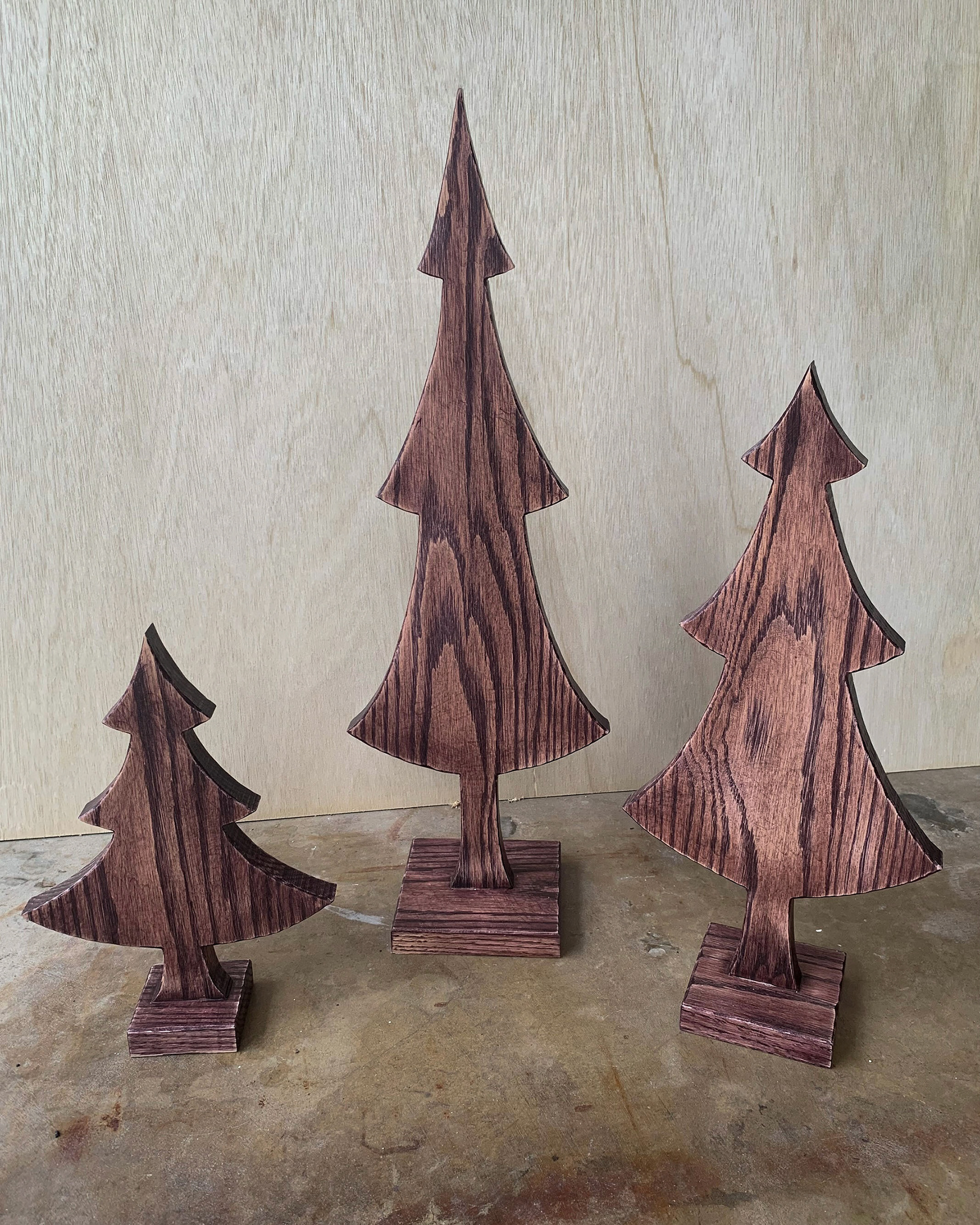 3 Tree Set - black cherry (approximately 10”, 16”, and 26” tall) $75