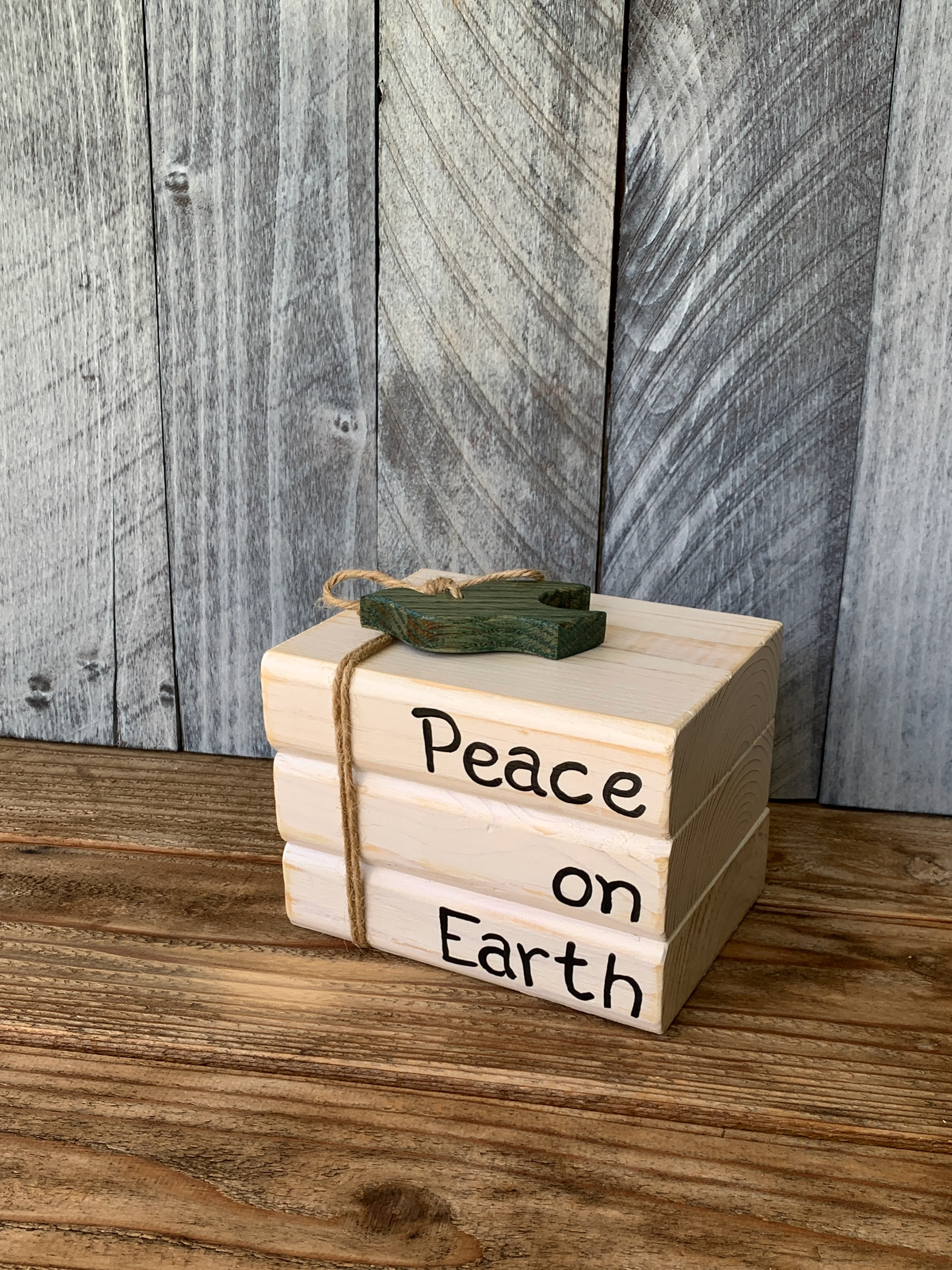 Peace on Earth Book Stack - whitewash (approximately 4.5” tall) $35