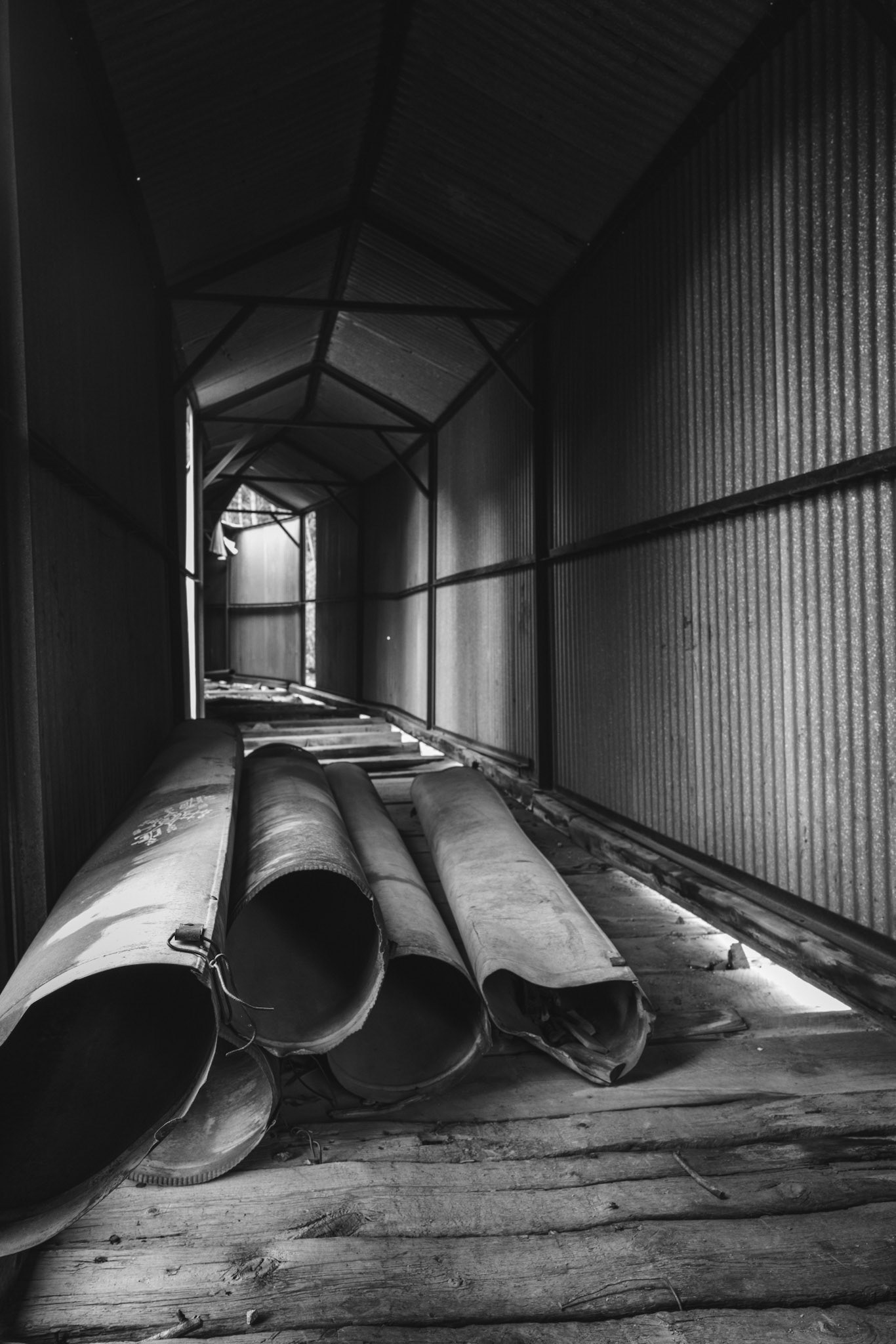 Pipes under a covered mine pathway