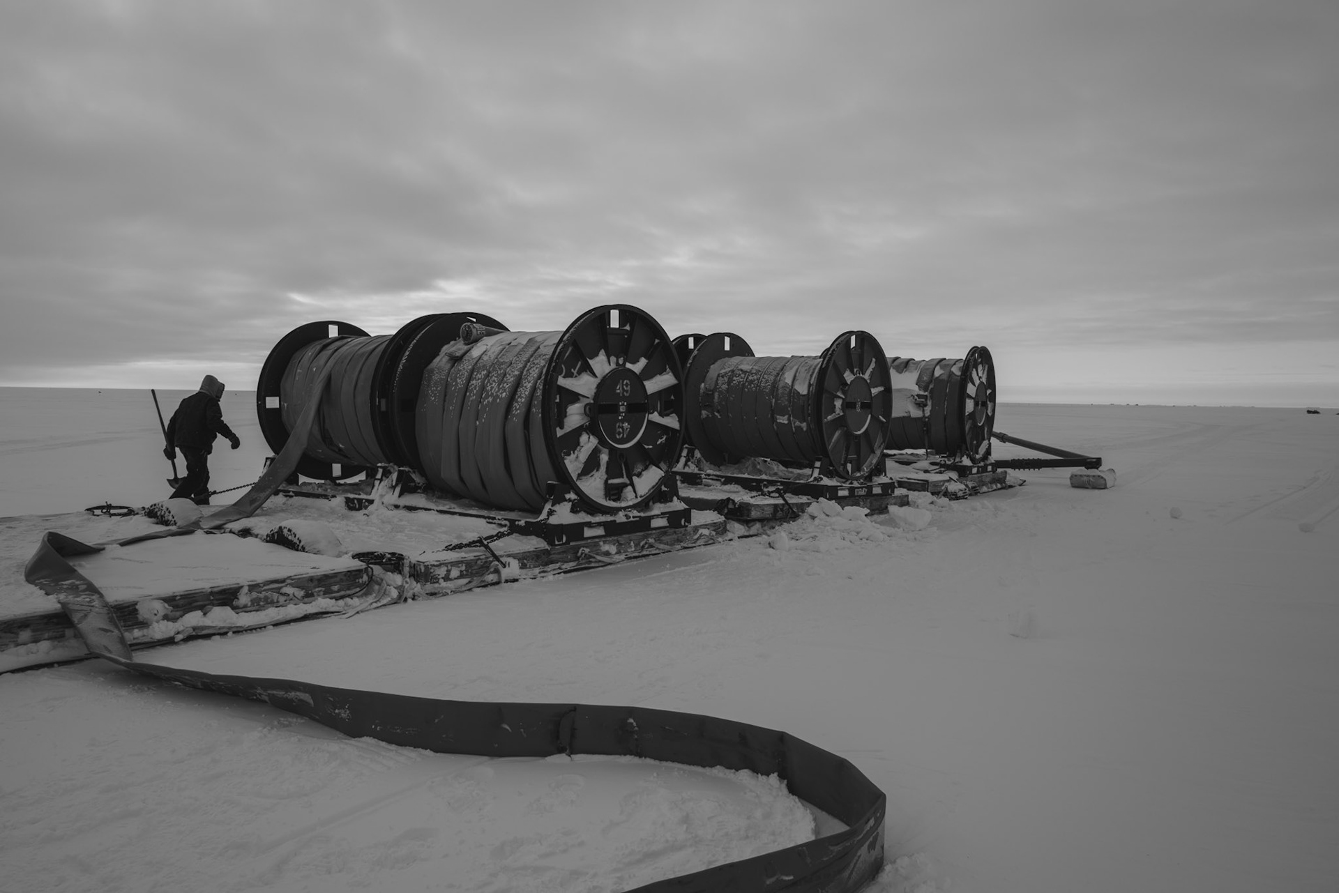 6 spools of hose ready to be laid on the ice shelf and out to Williams Field