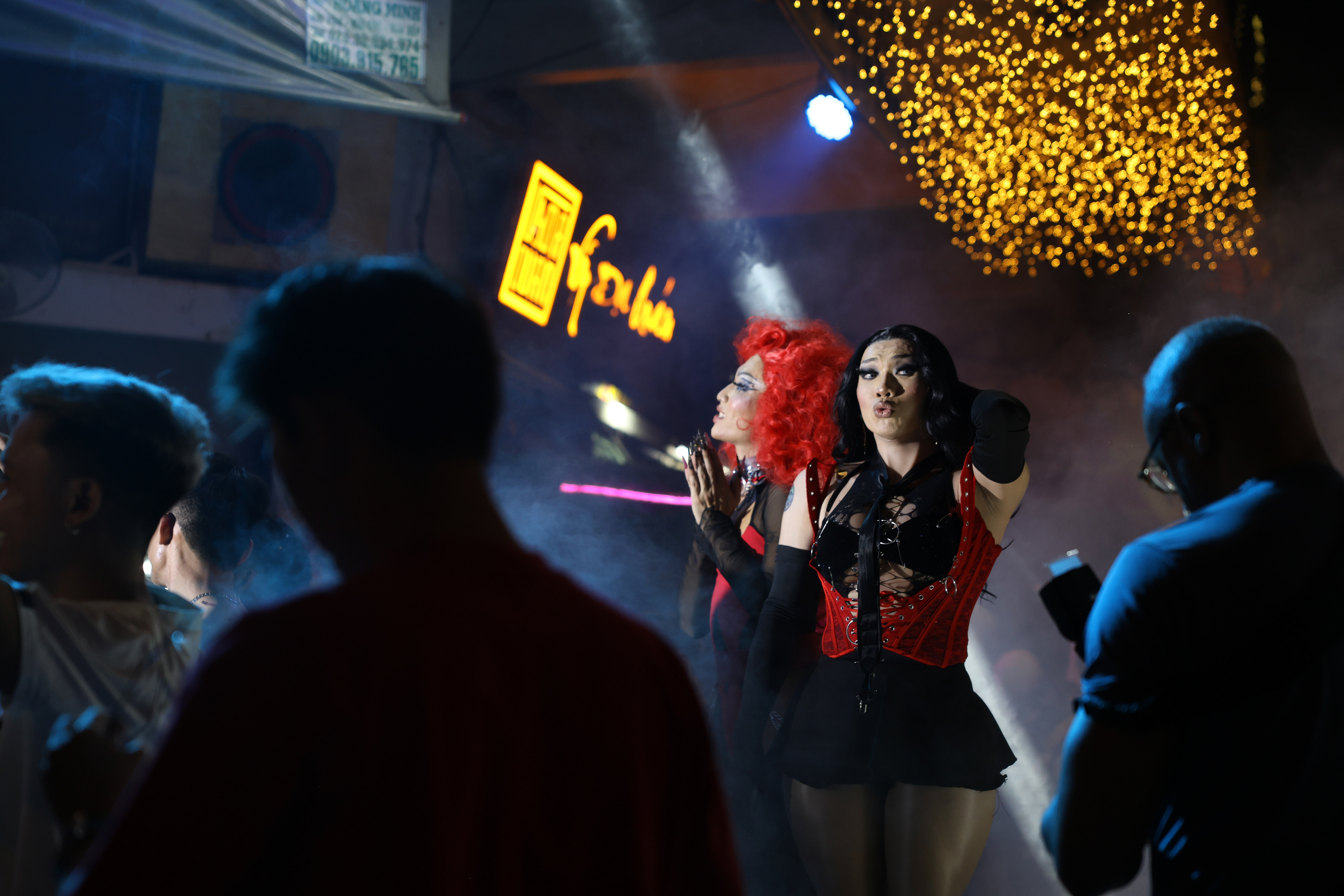 Two drag queens lip sync to ABBA’s international hit “Happy New Year” a few minutes before midnight on Tuesday, Dec. 31, 2024 in District 1, Ho Chi Minh City, Vietnam. While Vietnam’s culture, traditions and society are generally considered to be conservative, same-sex relationships have been legal throughout nearly all of Vietnam’s history.