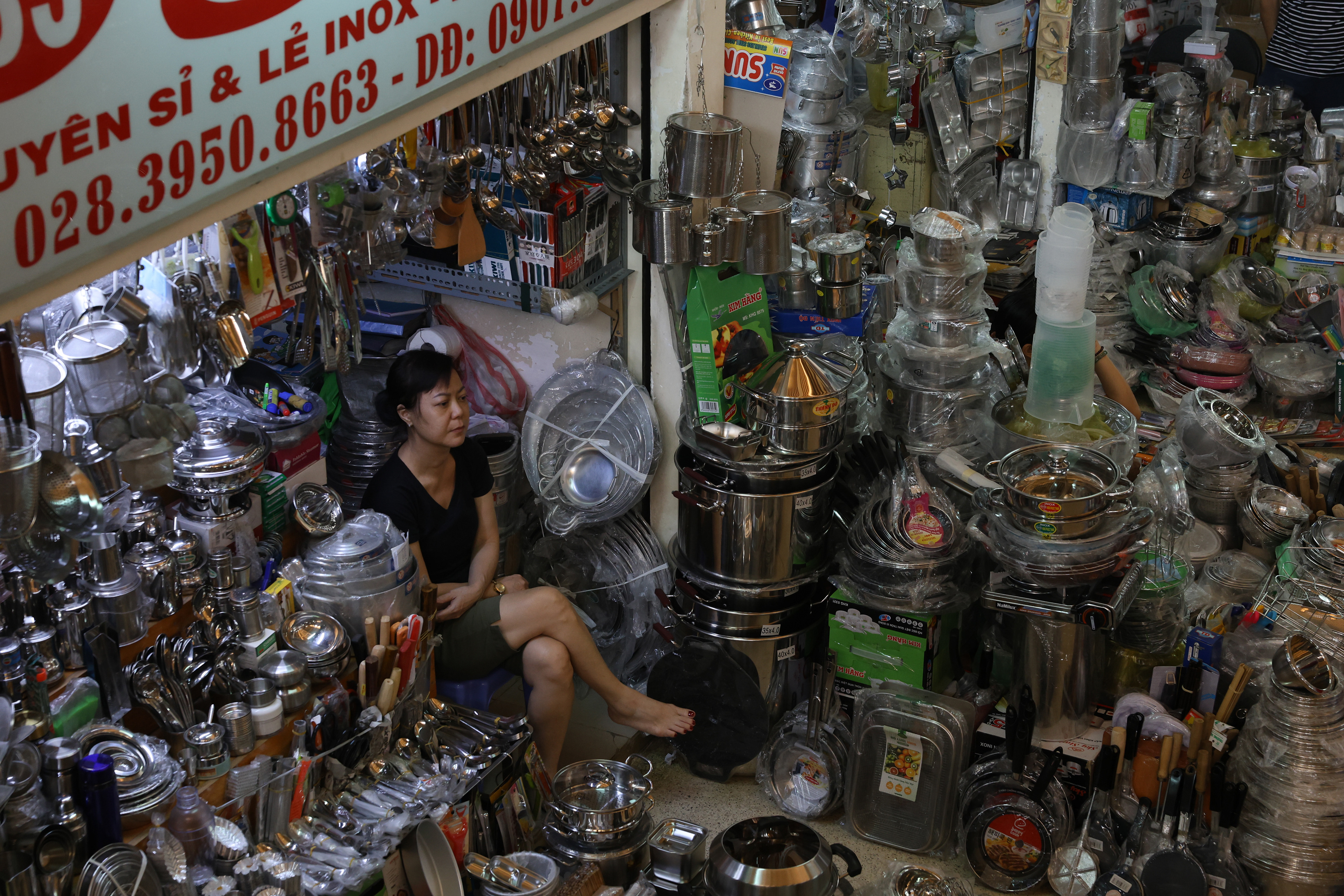 A vendor sells kitchen wares in the Binh Tay market in the western Chinatown district of Ho Chi Minh City, Vietnam, on Thursday, January 2, 2025. According to posted signs in the market, there are about 600 different shops with a total floor area spanning 6.2 acres.