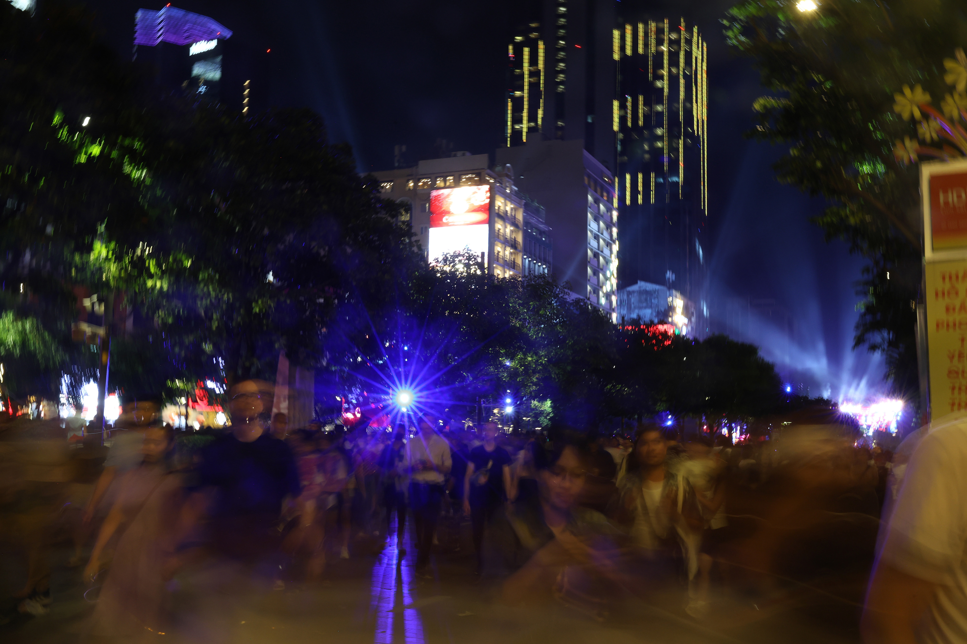 Crowds disperse after the New Year's countdown in downtown District 1 Ho Chi Minh City, Vietnam on Wednesday, Jan. 1, 2025. The city’s population is tallied at 8.9 million, with 750,000 tourists in the city at midnight, according to one of Vietnam’s biggest newspapers, Vietnam Plus.