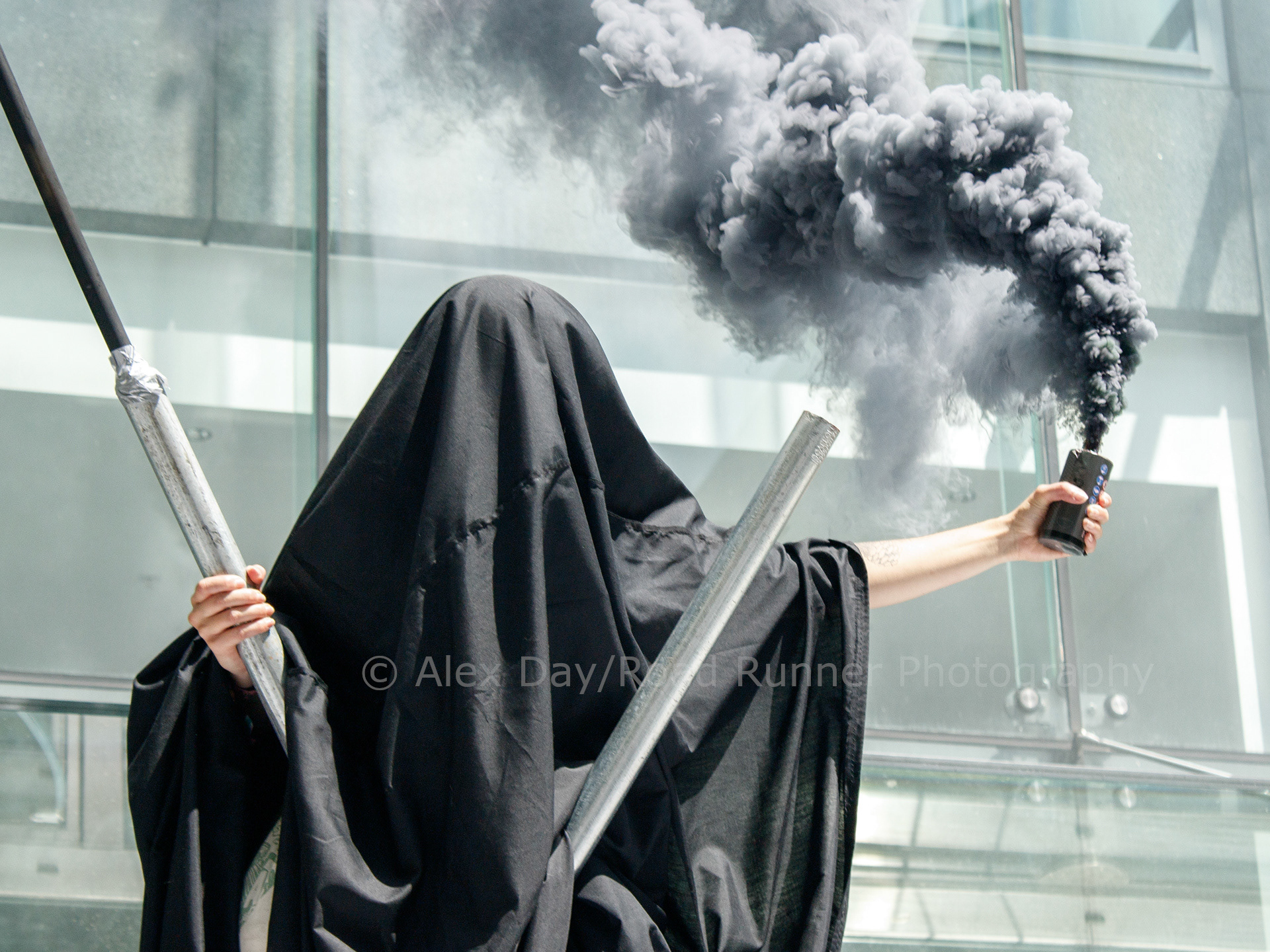 Cut The Ties protester with flare