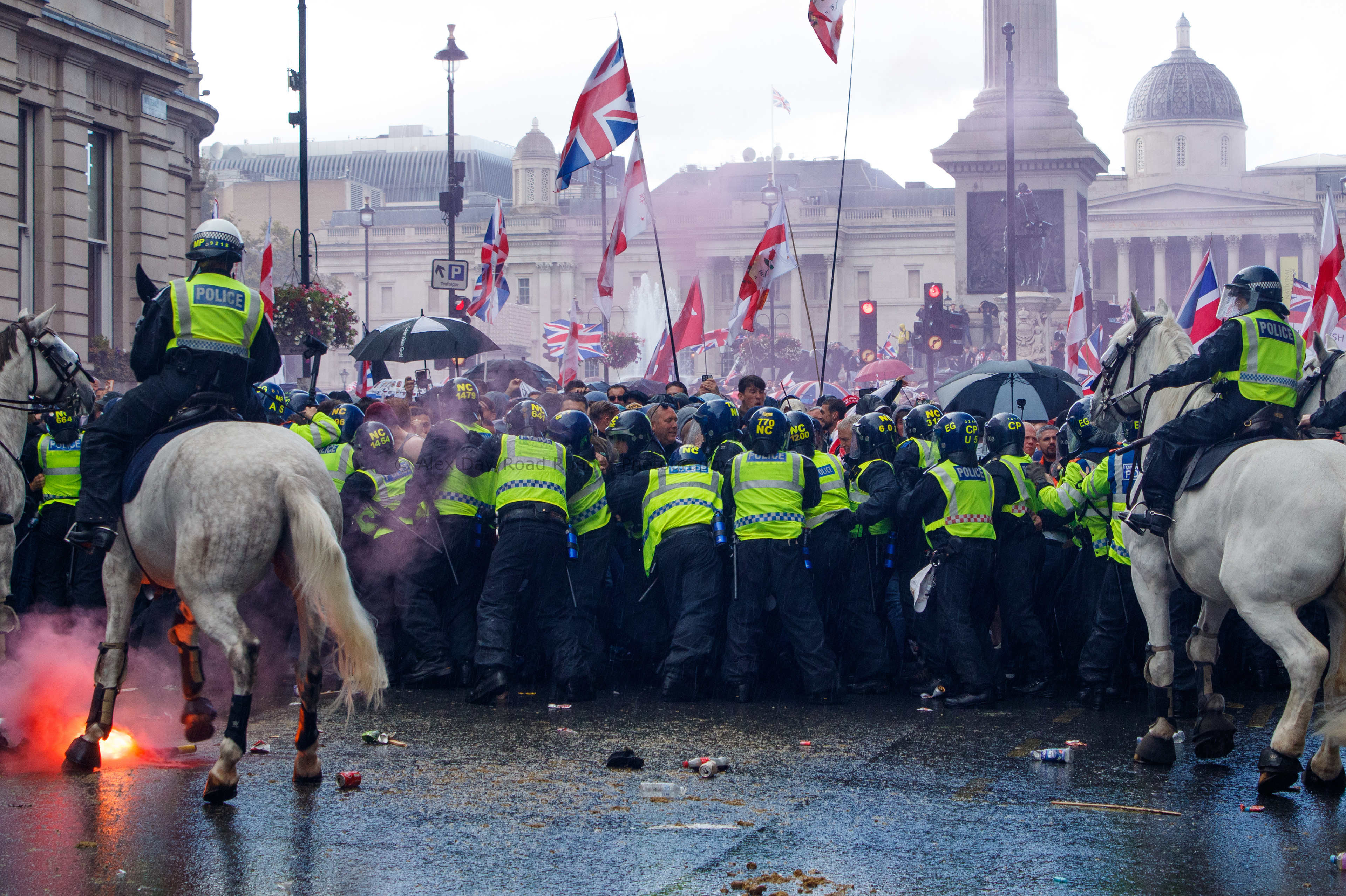 Protesters and police clash in Trafalgar Square