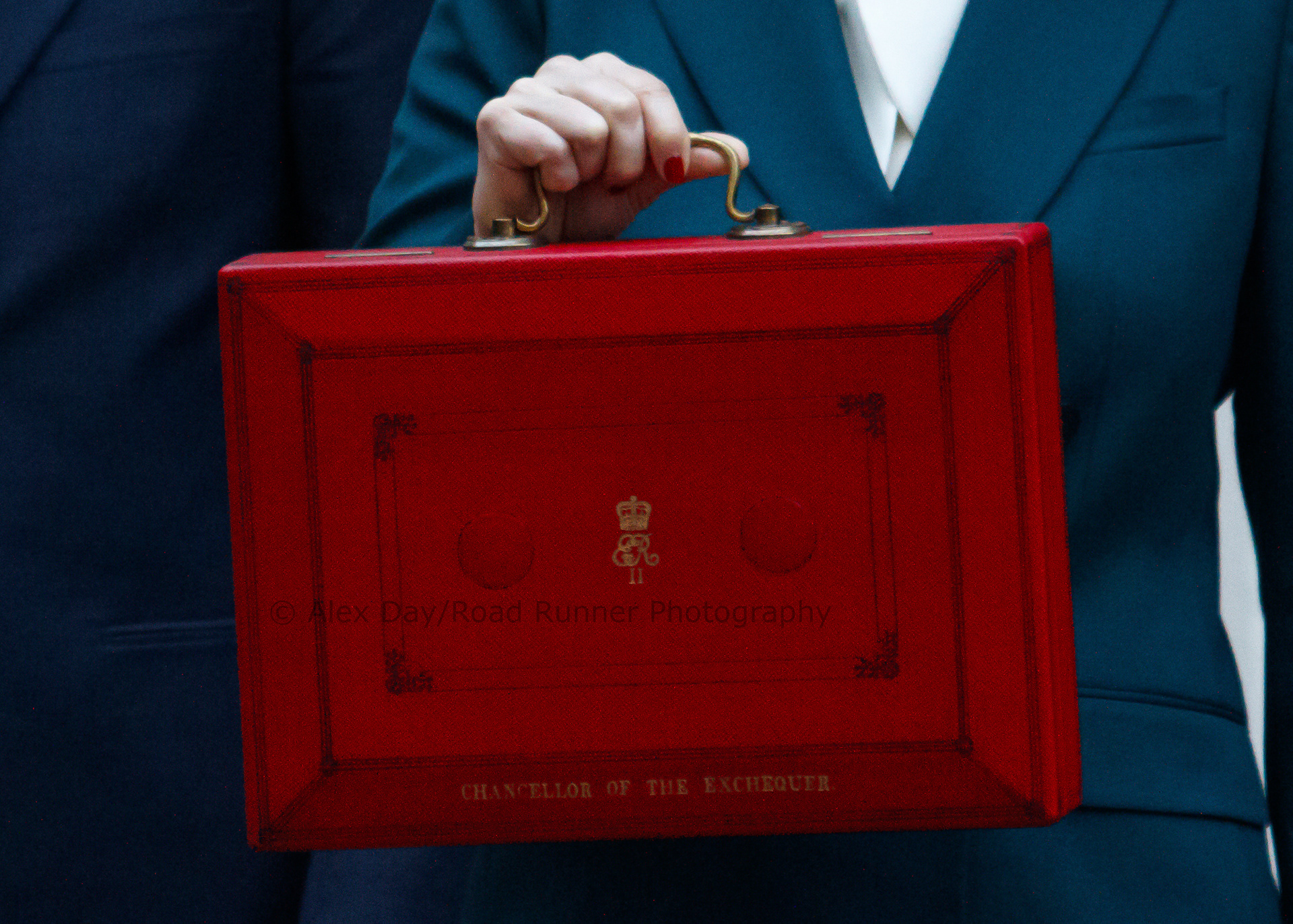 Chancellor of the Exchequer Rachel Reeves stands outside number 11 Downing Street holding the budget red box