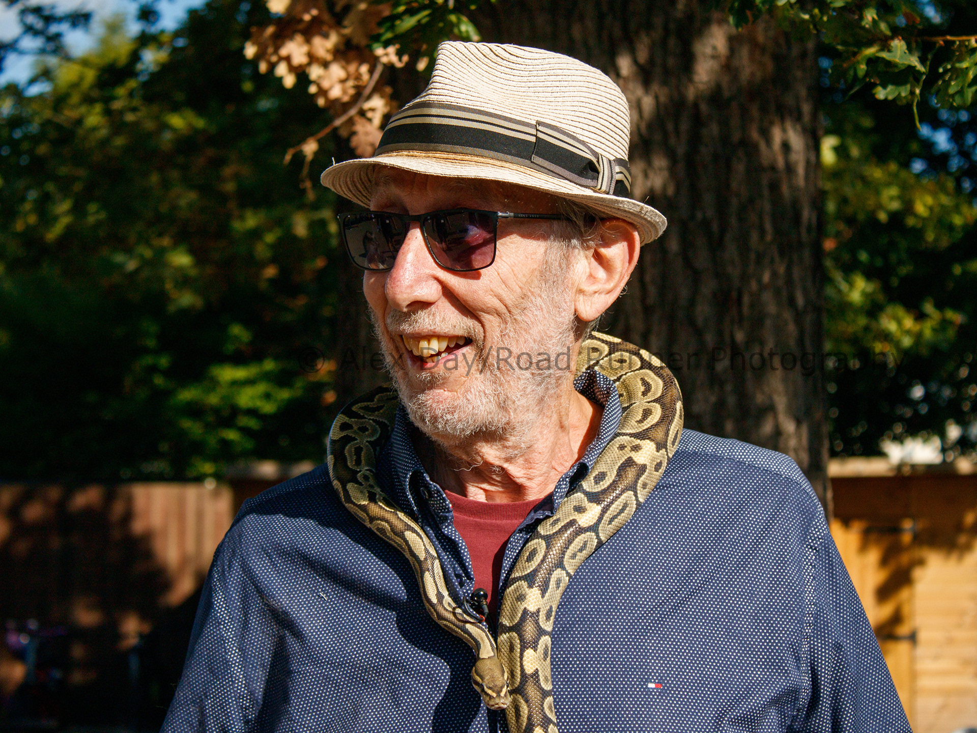 Michael Rosen with a snake around his neck