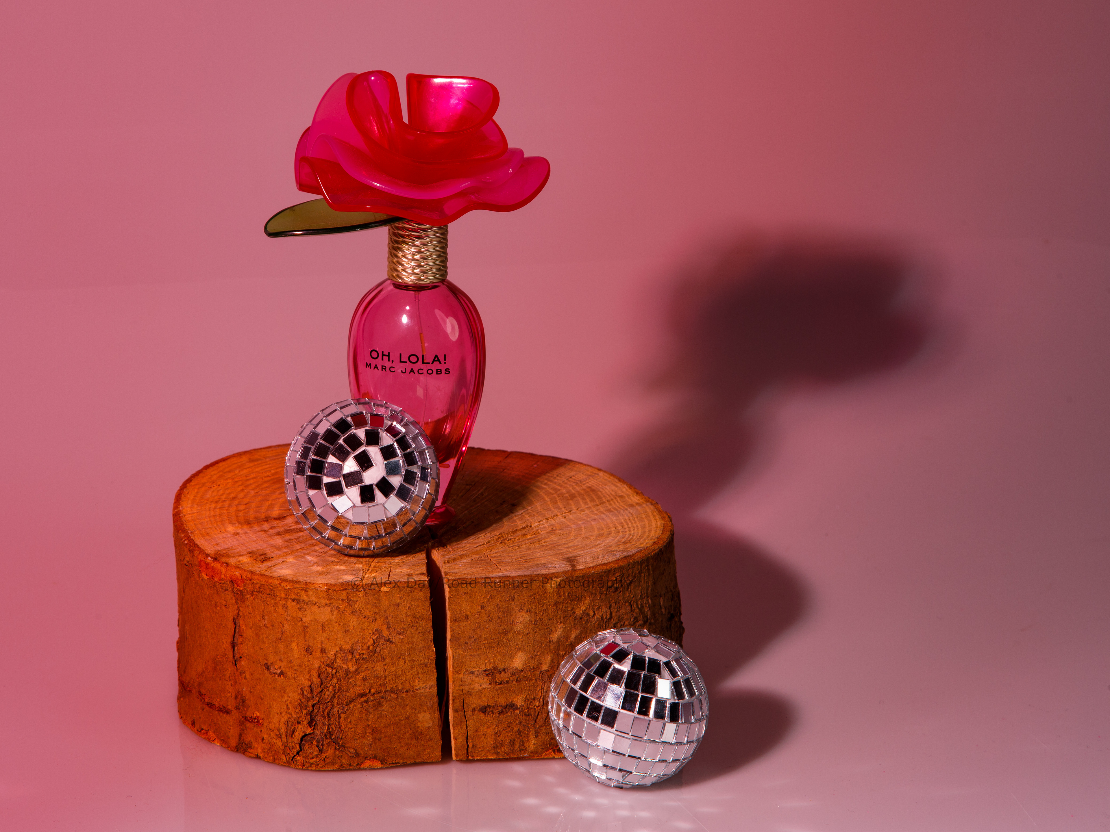 Practice product work featuring a bottle of perfume