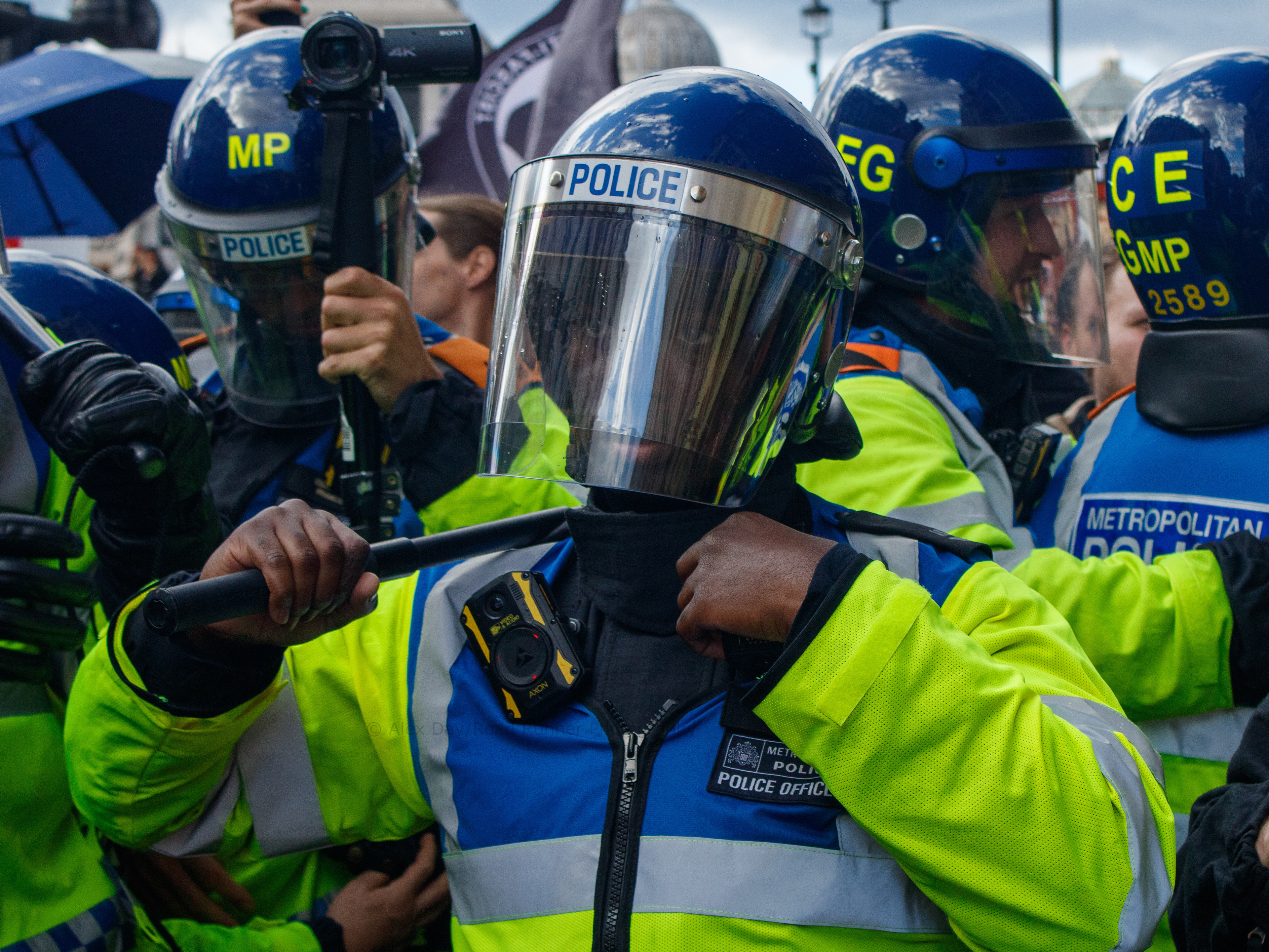 Police and protesters face off at the Unite the Kingdom protest