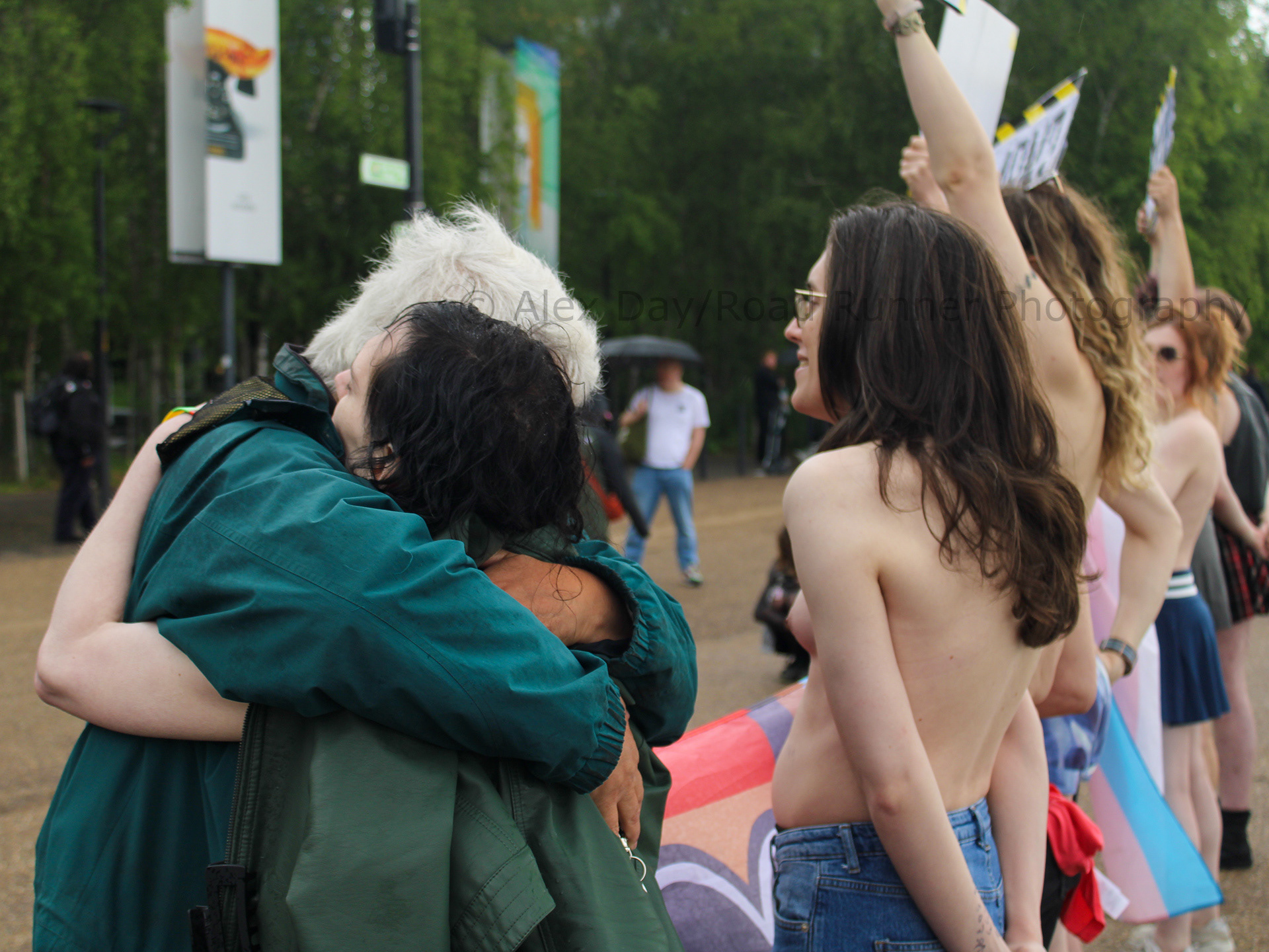 Topless trans activists take part in a protest