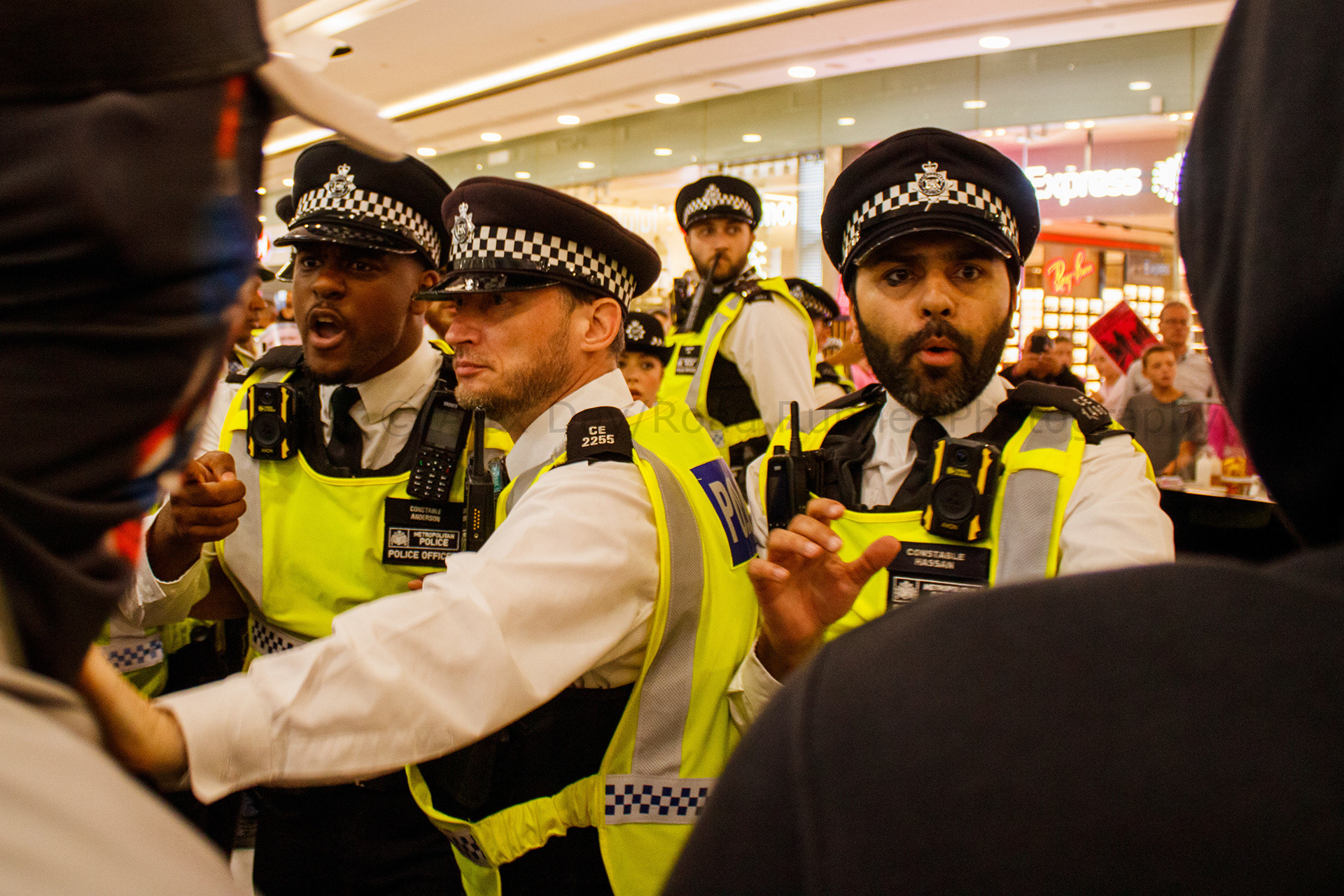 Police clash with protesters in Canary Wharf