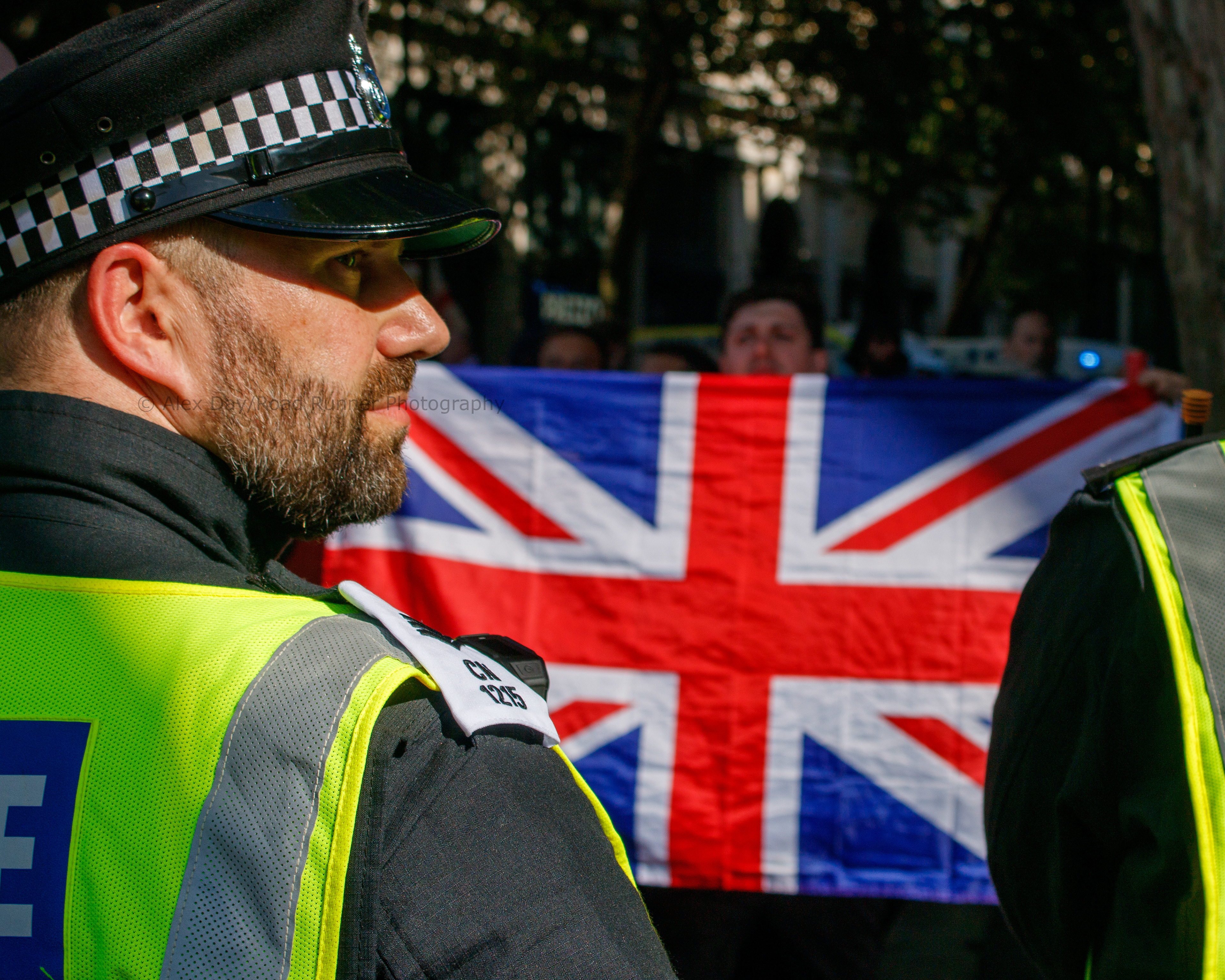 Police and protesters face off at the Unite the Kingdom protest