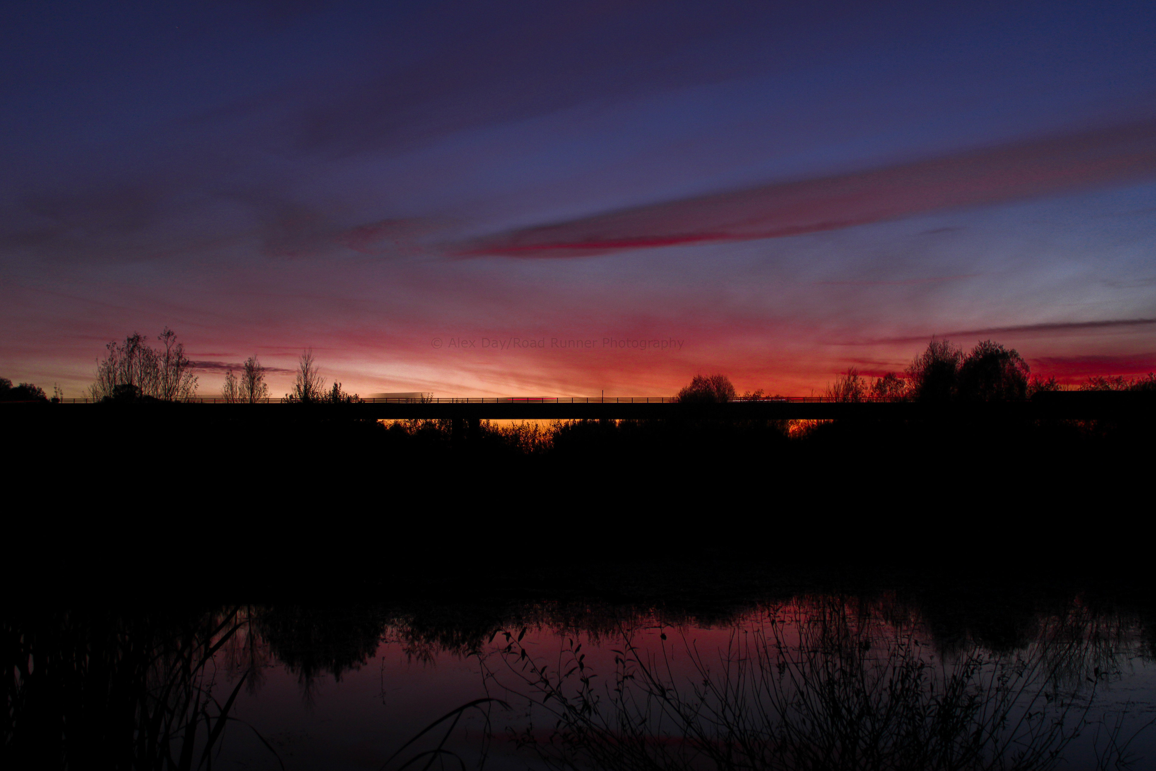 Sunset over Ware A10 Kingsmead Viaduct