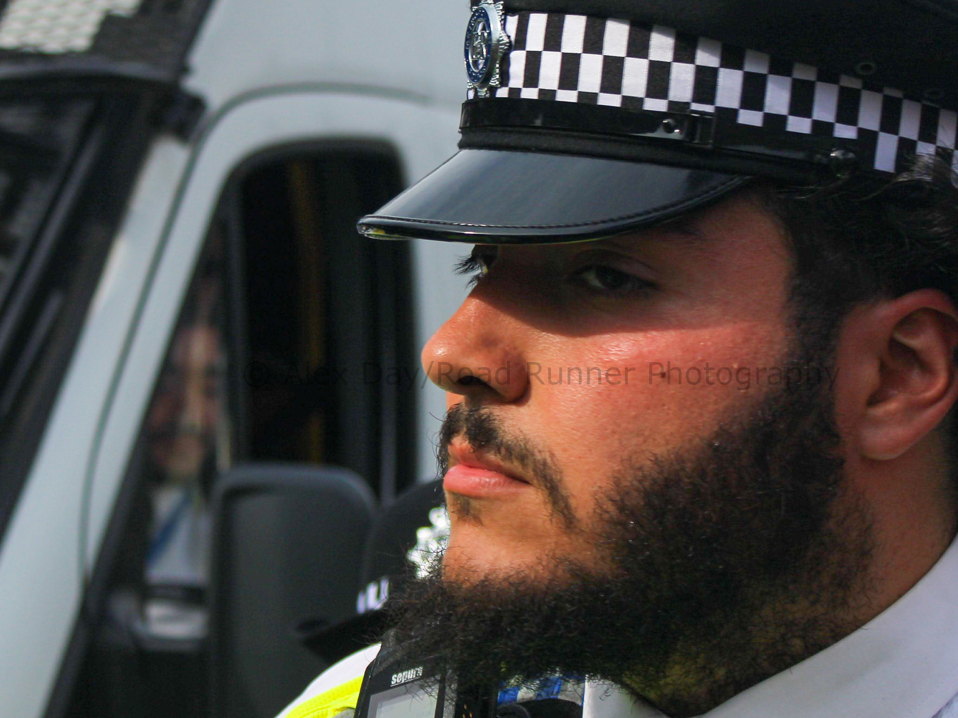 A police officer at a demo in support of Palestine Action