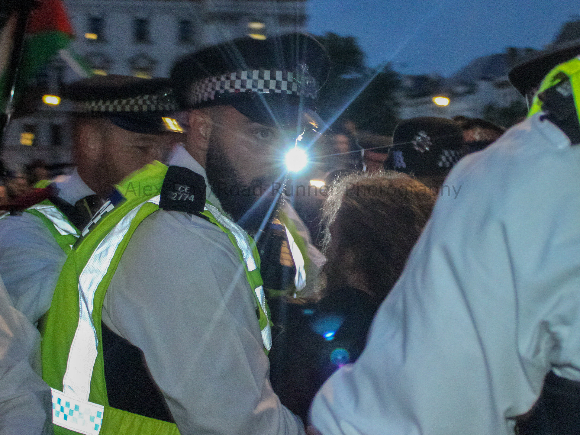 A protester is dragged away by police at a protest in support of Palestine Action