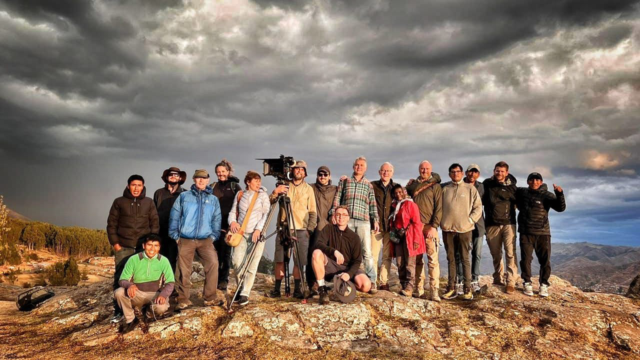 What a team of crew, fixers and porters at the stunning Sacsayhuaman in Peru.