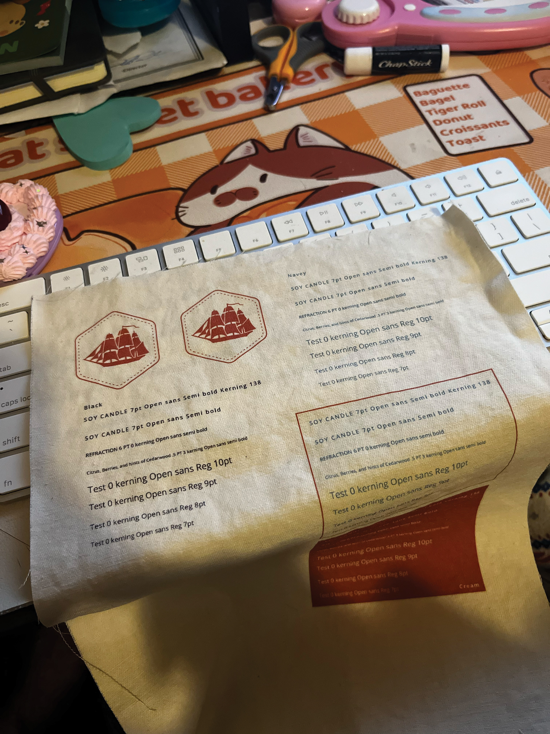 Inkjet printed fabric test for colors and fonts.